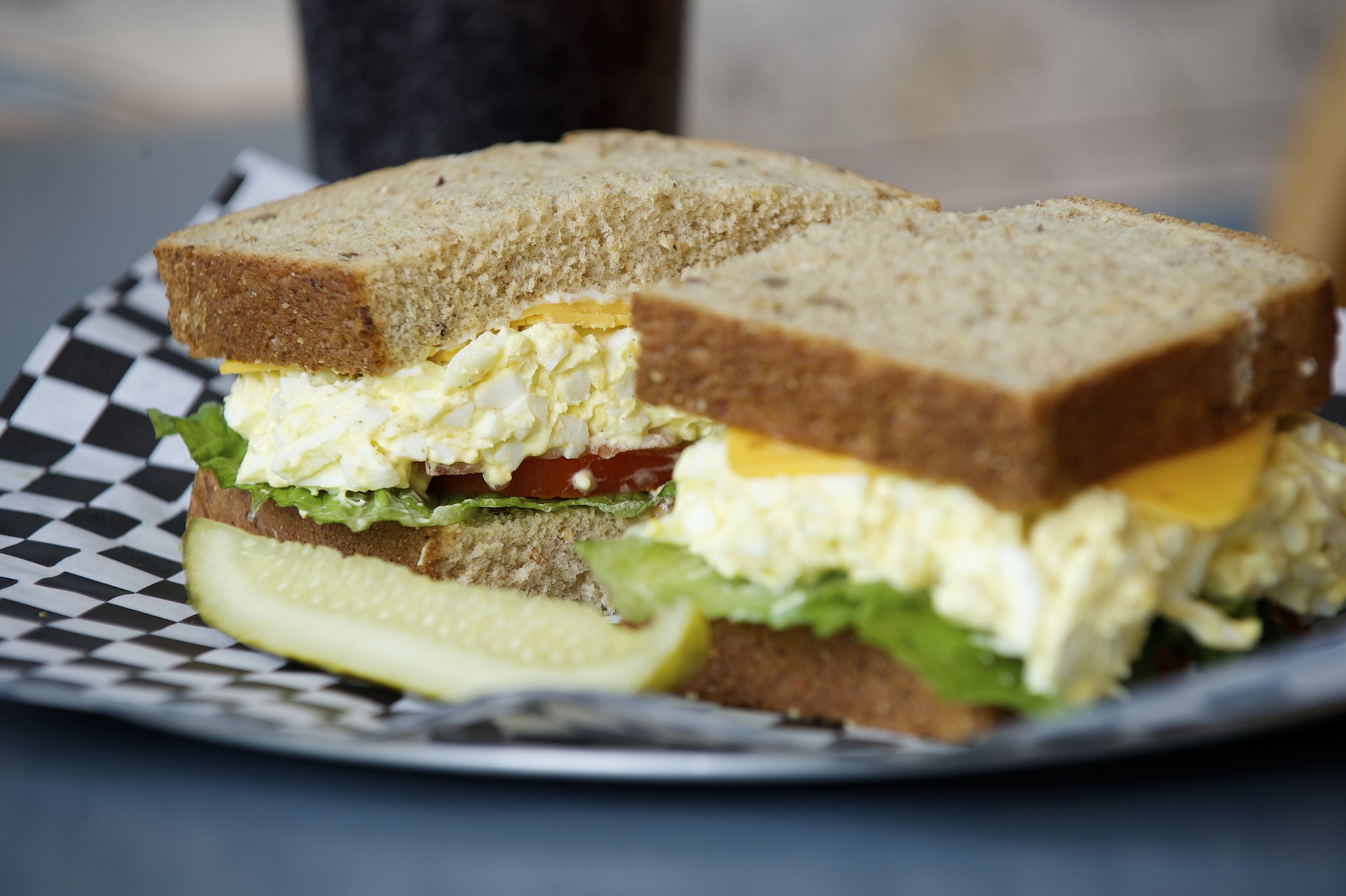 An egg salad and cheddar cheese sandwich is served May 29 at City Sandwich in downtown Vancouver.