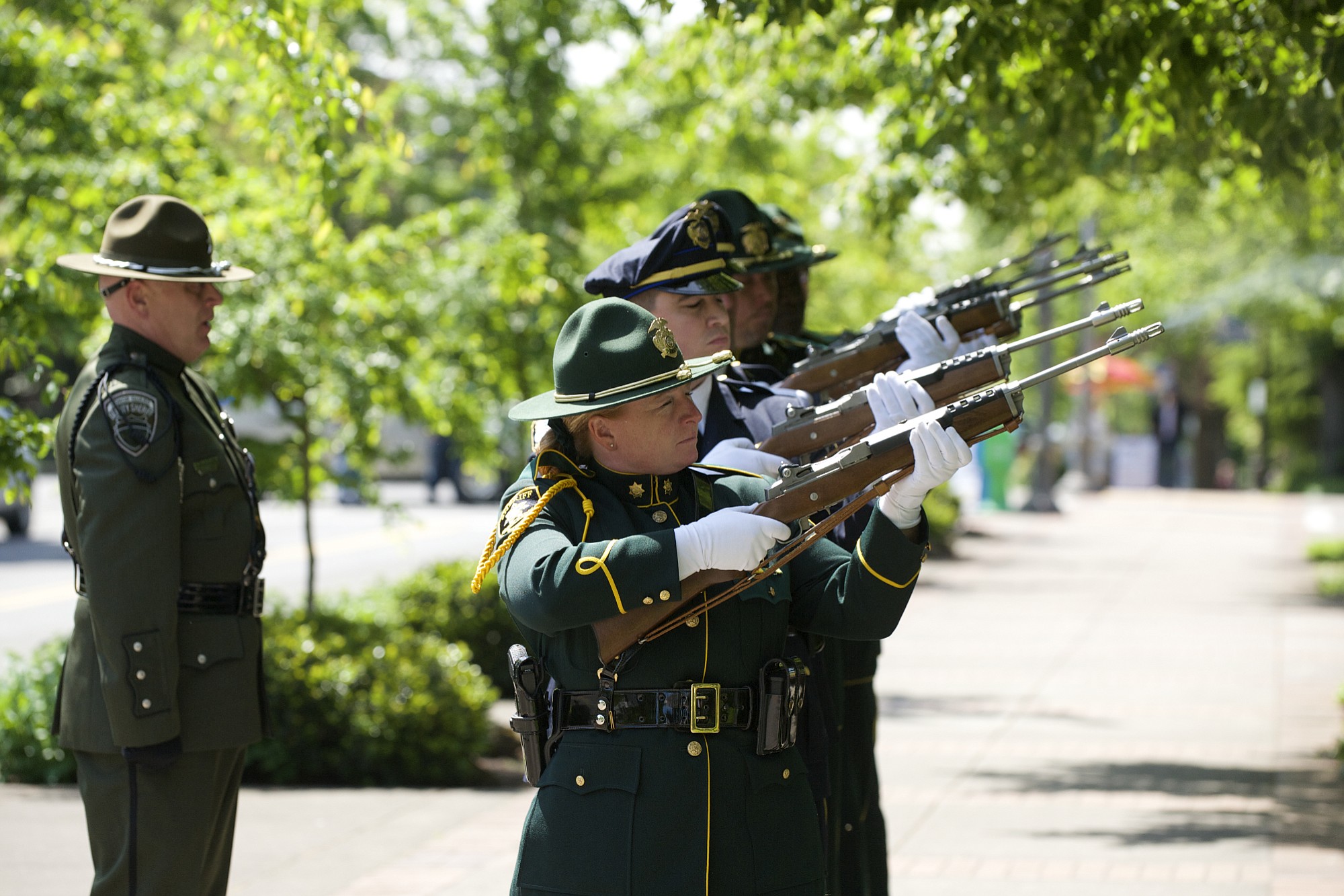 Photos by Steven Lane/The Columbian
A multi-agency honor guard fires the 21-gun salute Thursday morning at the 2015 Annual Law Enforcement Memorial Ceremony.