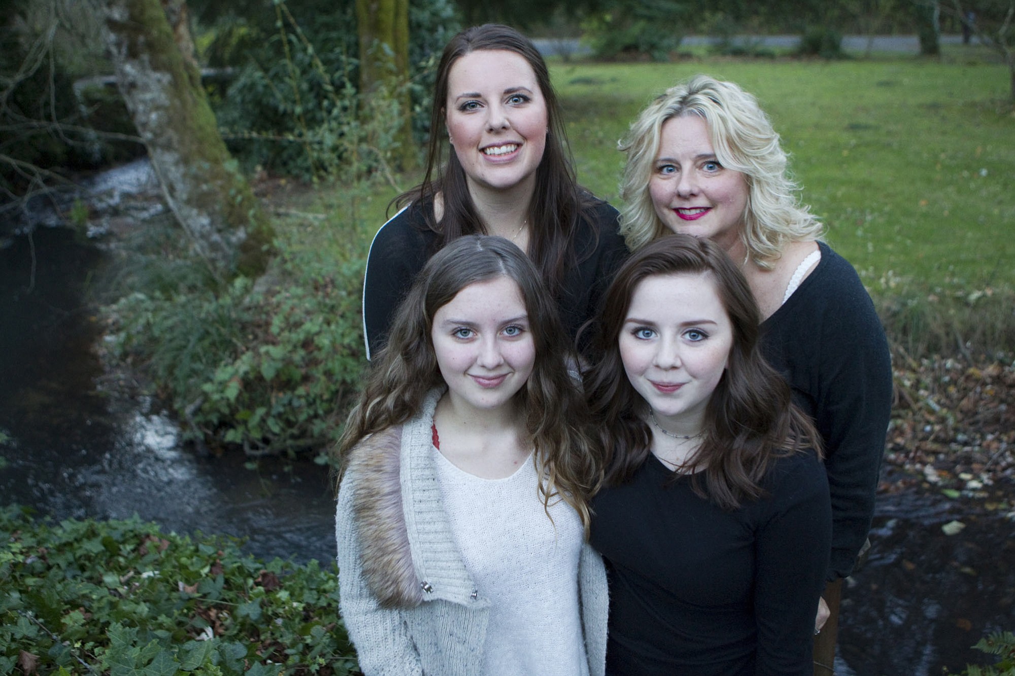 Lilliane Grahek, front left, with her sisters, Genevieve Grahek, front right, and Karlene Hamar, back left, and her mom, Kerin Clark Severson, at their Vancouver home.
