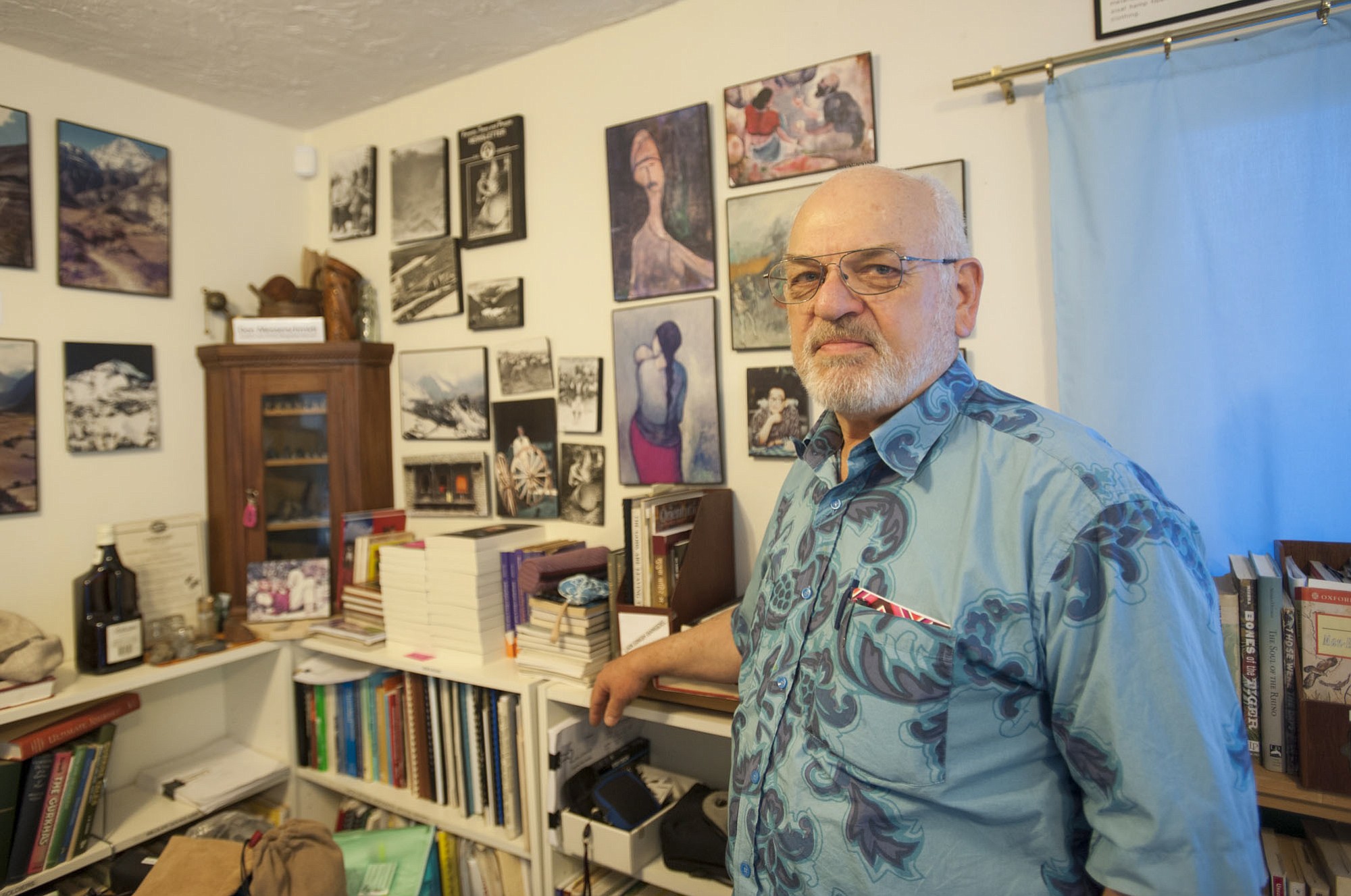 Don Messerschmidt's office is filled with books, keepsakes and artwork representing his connections with Nepal, which started in 1963 as a Peace Corps volunteer.