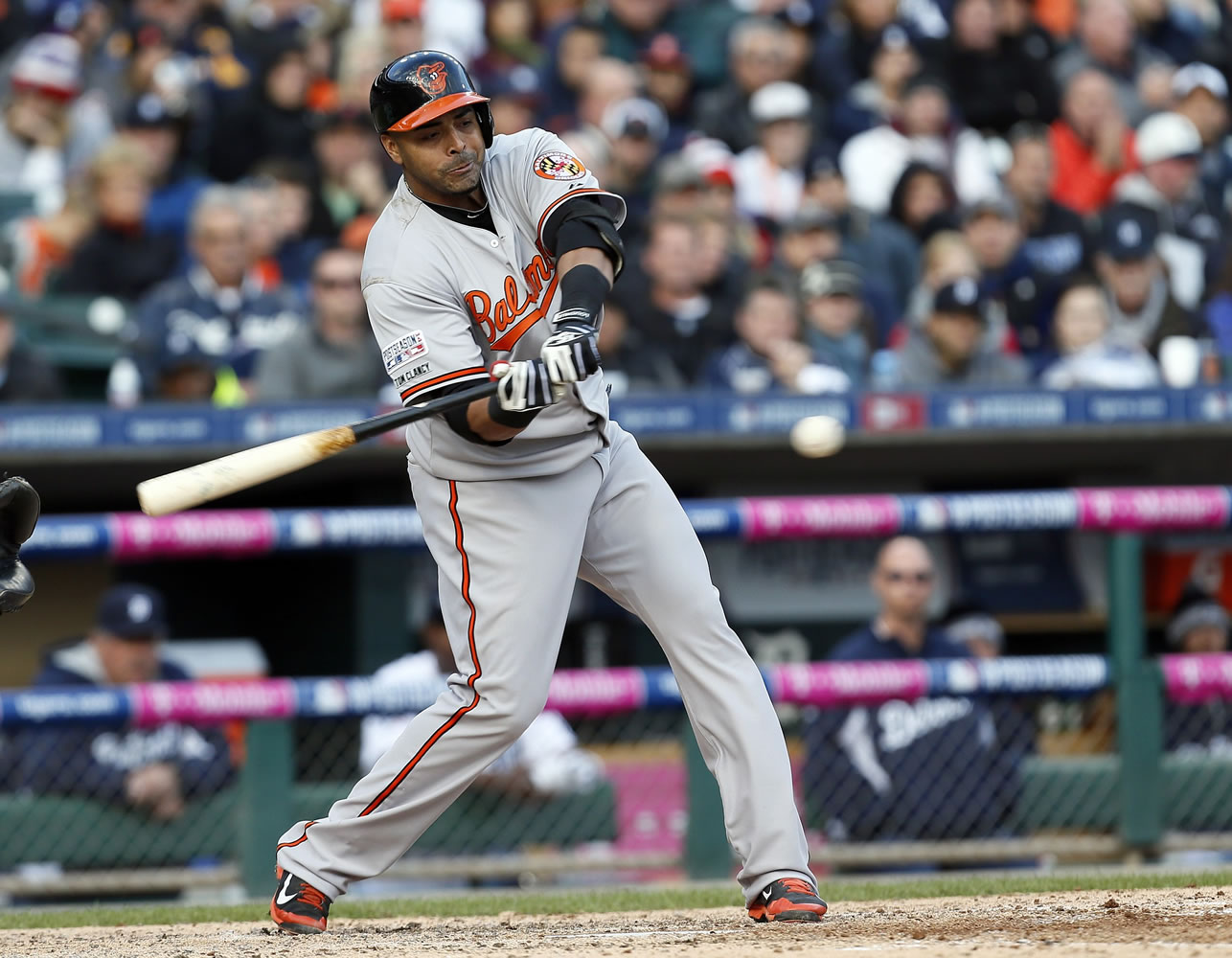 Baltimore Orioles designated hitter Nelson Cruz hits a two-run home run in the sixth inning in Game 3 of the AL Division Series against the Detroit Tigers, Sunday, Oct. 5, 2014, in Detroit.