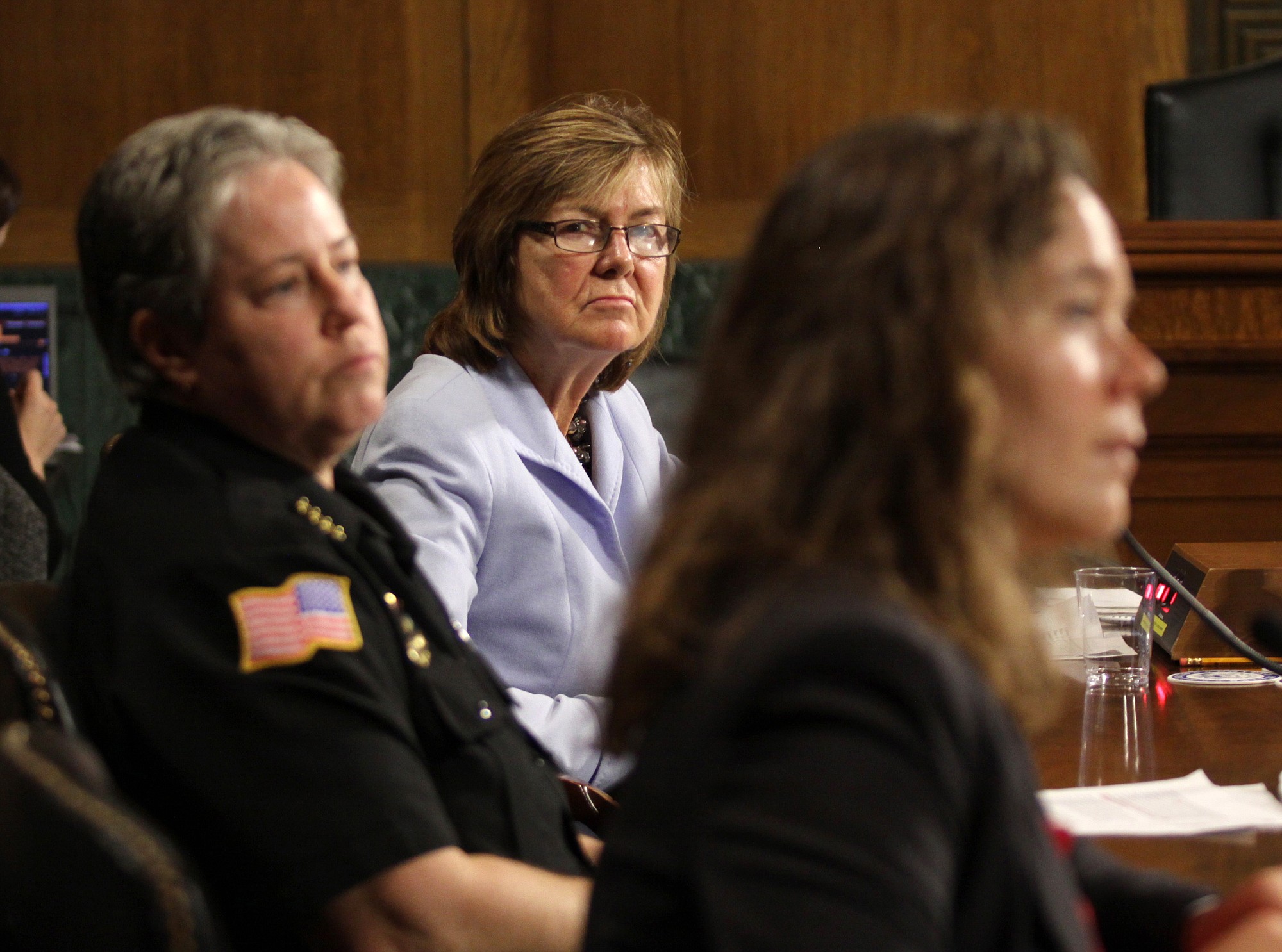 Peg Langhammer, executive director of Day One in Rhode Island, center, and Police Chief Kathy Zoner, left, listen as Angela Fleischer, assistant director of Student Support and Intervention for Confidential Advising at Southern Oregon University, right, testifies on Capitol Hill in Washington on Tuesday before the Senate Crime and Terrorism subcommittee hearing: &quot;Campus Sexual Assault: the Roles and Responsibilities of Law Enforcement.&quot; Cornell University