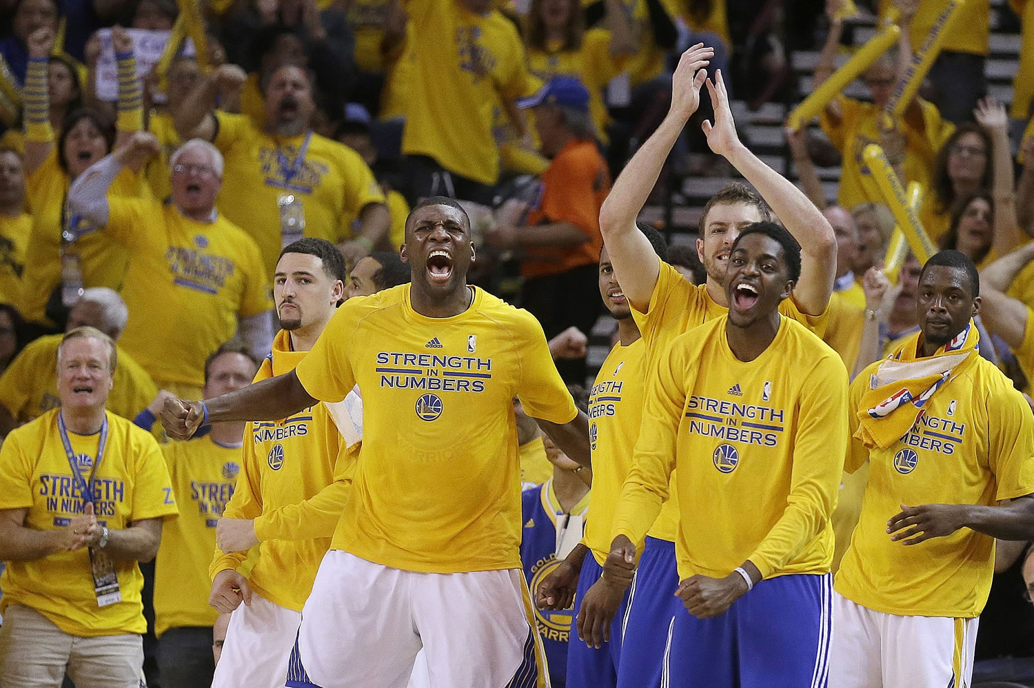 Golden State Warriors players react during the second half of Game 5 of the NBA basketball Western Conference finals against the Houston Rockets in Oakland, Calif., Wednesday, May 27, 2015.