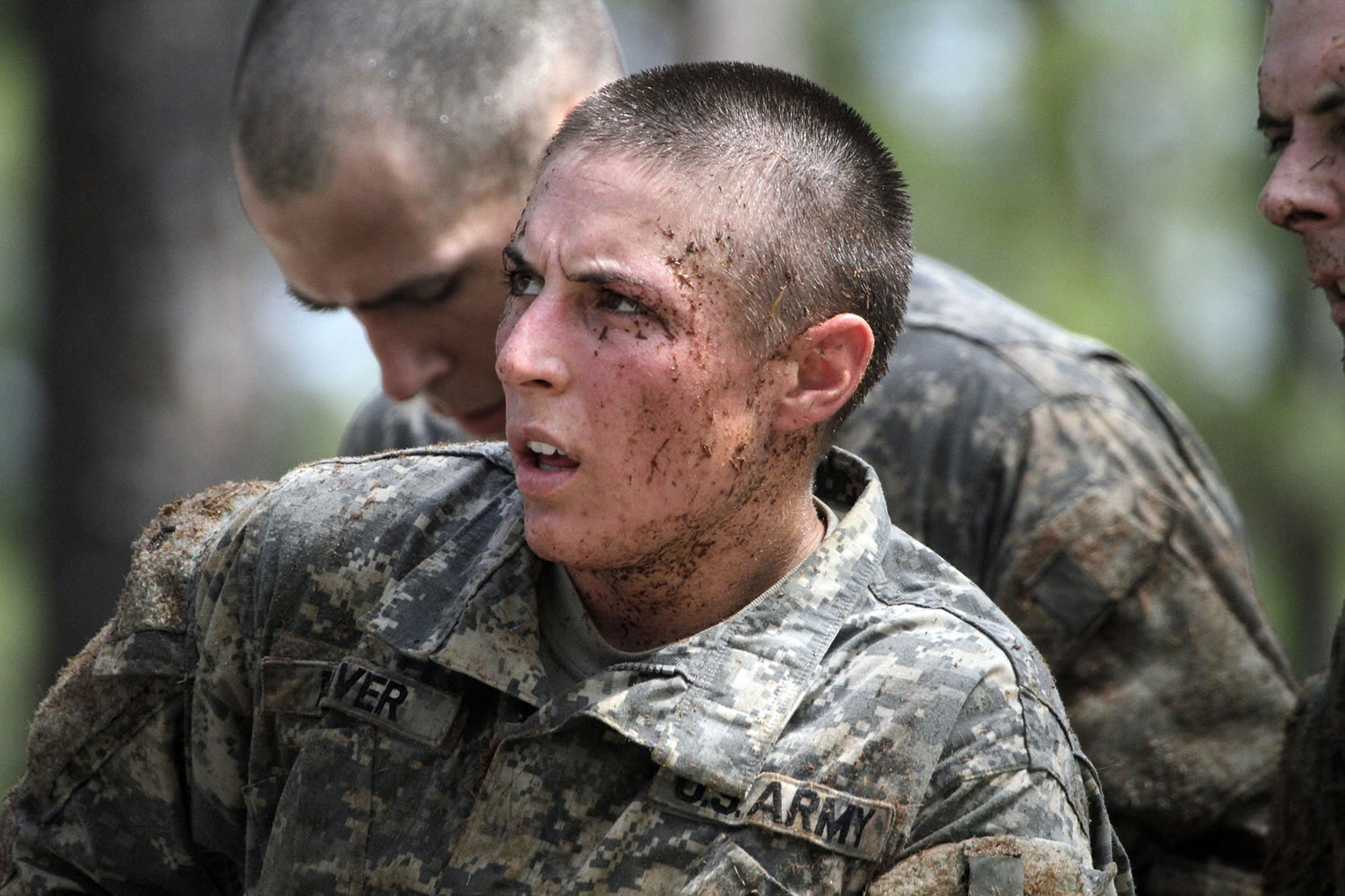One of the 20 female soldiers, among the 400 students who qualified to start Ranger School, tackles the Darby Queen obstacle course April 26, one of the toughest obstacle courses in U.S.