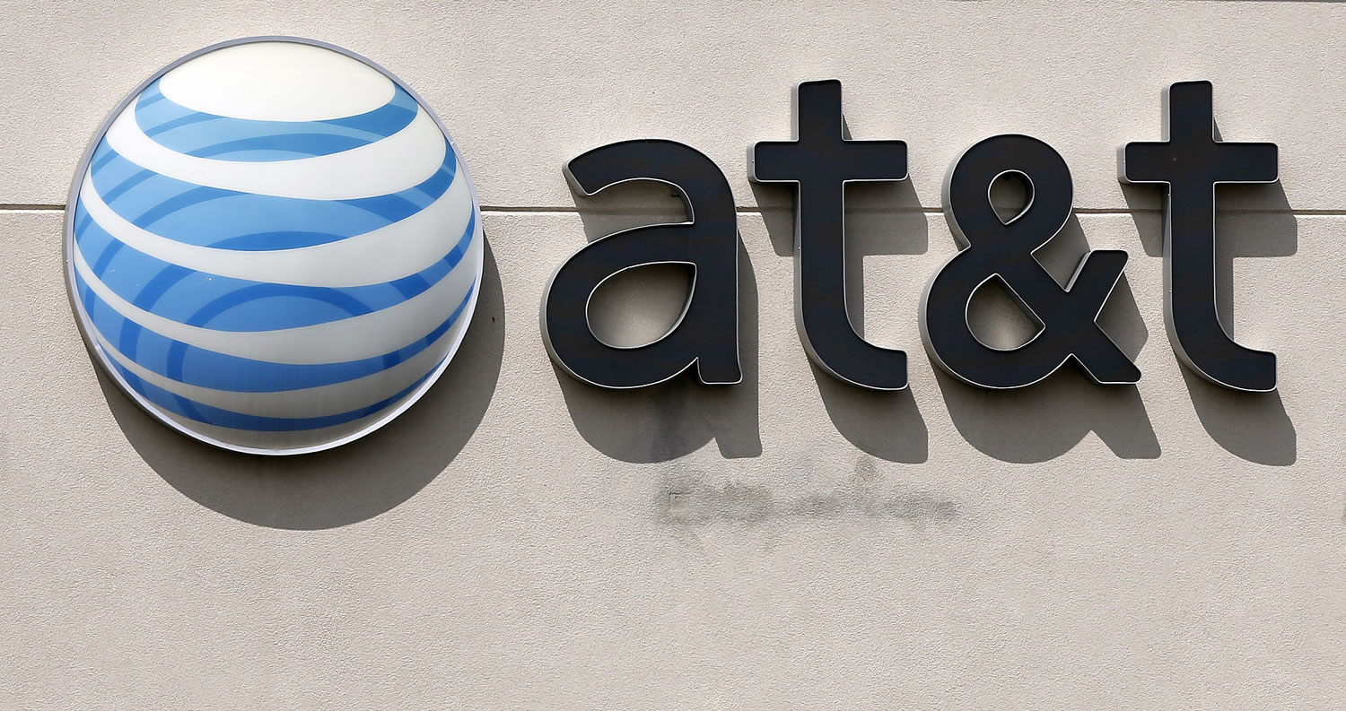 An AT&amp;T logo on a store in Dedham, Mass.