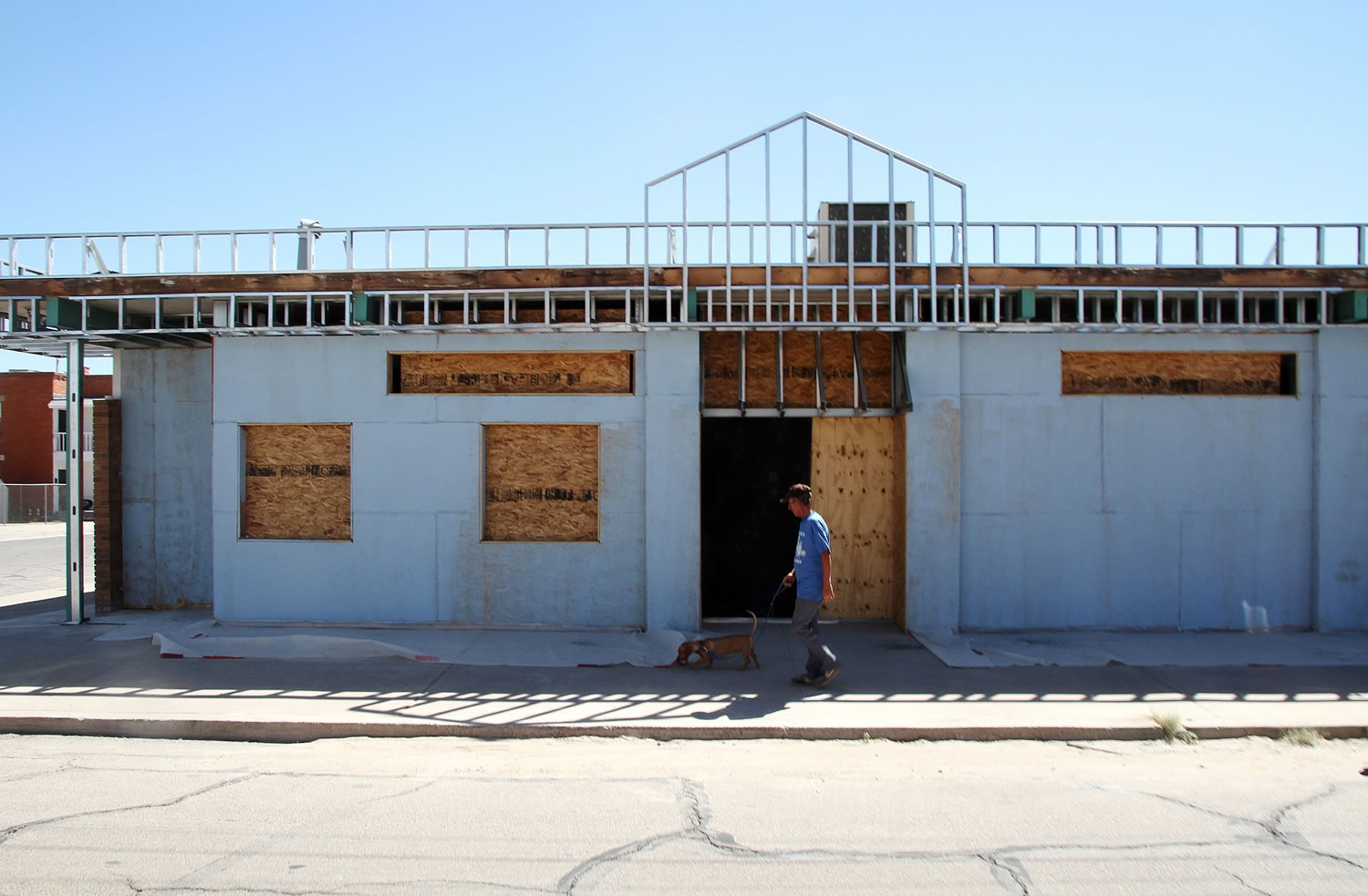 A man walks Friday past the former site of a clinic that offered abortions in El Paso, Texas.
