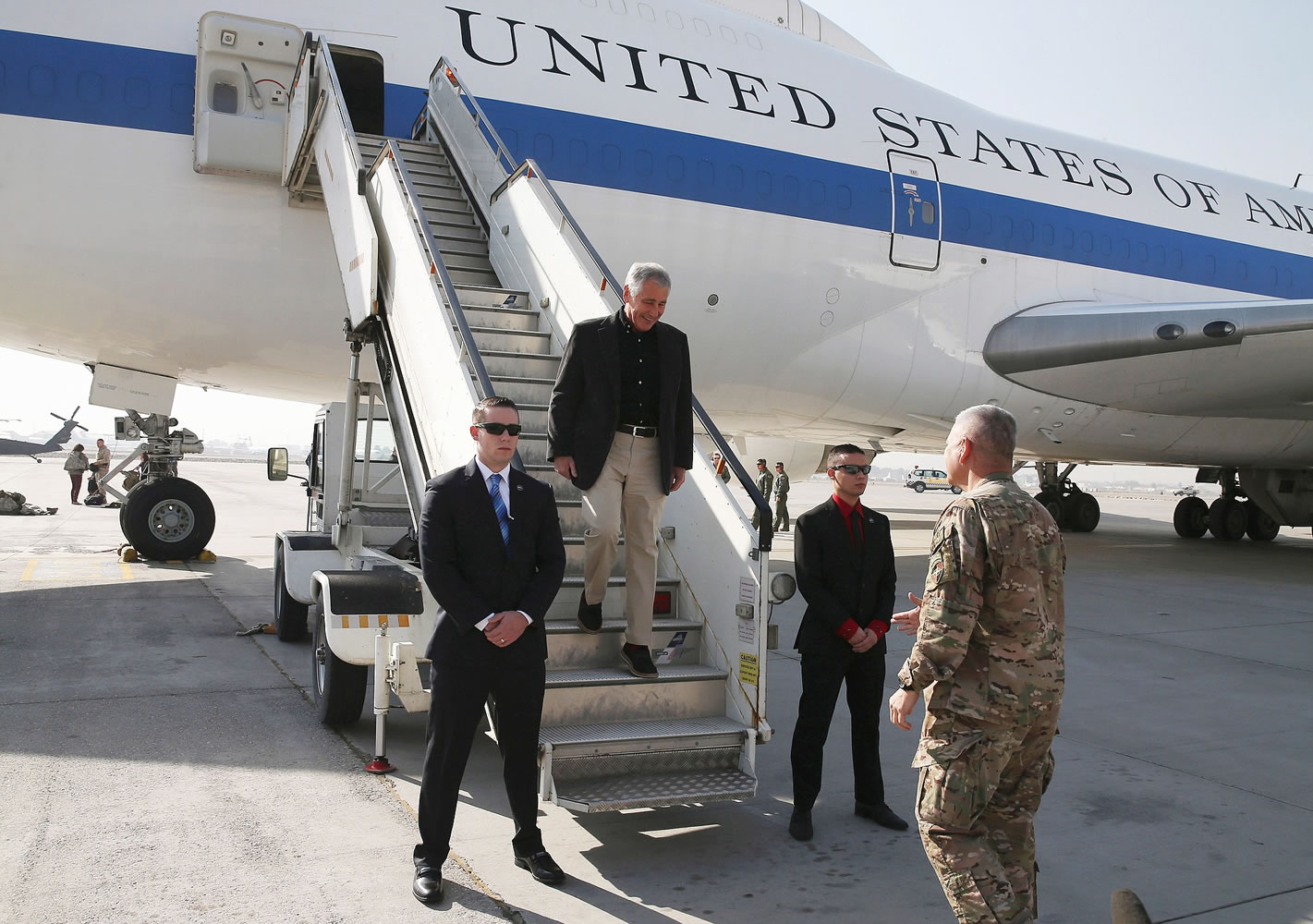 U.S. Secretary of Defense Chuck Hagel is greeted after arriving Saturday in Kabul, Afghanistan. Speaking in Afghanistan, Secretary Hagel said American photojournalist Luke Somers &quot;and a second non-U.S. citizen hostage were murdered&quot; by al-Qaida militants during a failed U.S.