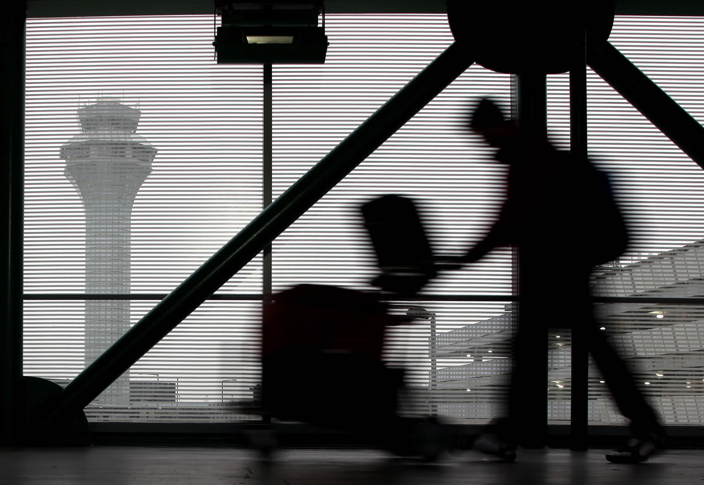A traveler walks through Terminal 3 at O'Hare International Airport in Chicago in 2013.