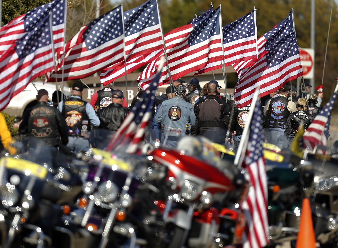 Patriot Guard Riders prepare to form a procession Friday for Chad Littlefield during his funeral at the First Baptist Church of Midlothian, Texas. Littlefield and former Navy SEAL sniper Chris Kyle found dead at a gun range on Feb. 2, 2013.