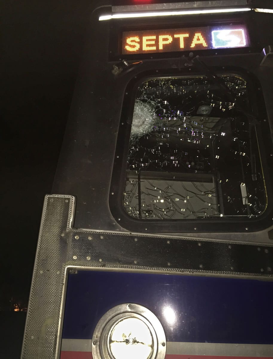 A Southeastern Pennsylvania Transportation Authority train is parked out of service in Philadelphia with a damaged windshield in front of the engineer's compartment. The FBI will examine the damage at the request of the National Transportation Safety Board.