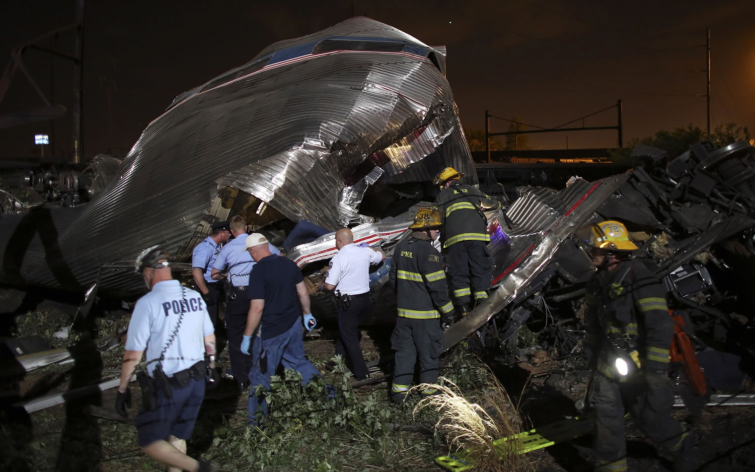 Emergency personnel work the scene of a train wreck Tuesday in Philadelphia.