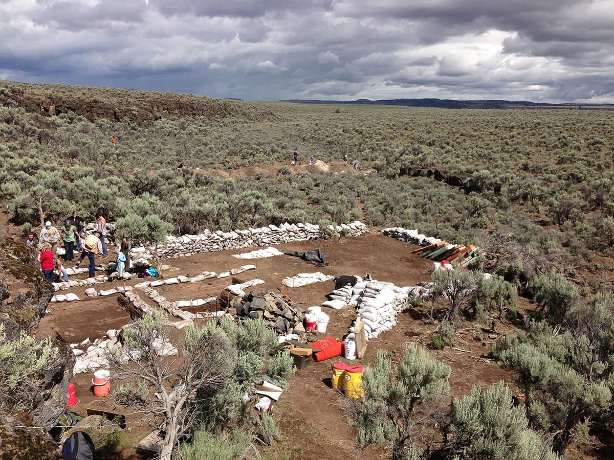 The Rimrock Draw Rockshelter archaelogical dig outside Riley, Ore., is shown in June 2013.