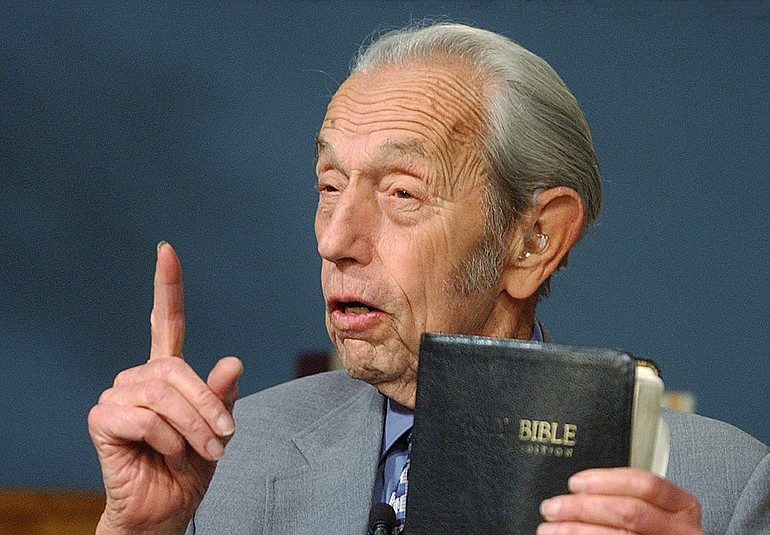 Harold Camping spoke while holding the Bible in December 2002 in San Leandro, Calif. A loosely organized Christian movement has spread the word around the globe that Jesus Christ will return to earth on Saturday, May 21, to gather the faithful into heaven. While the Christian mainstream isn't buying it, many other skeptics are believing it.