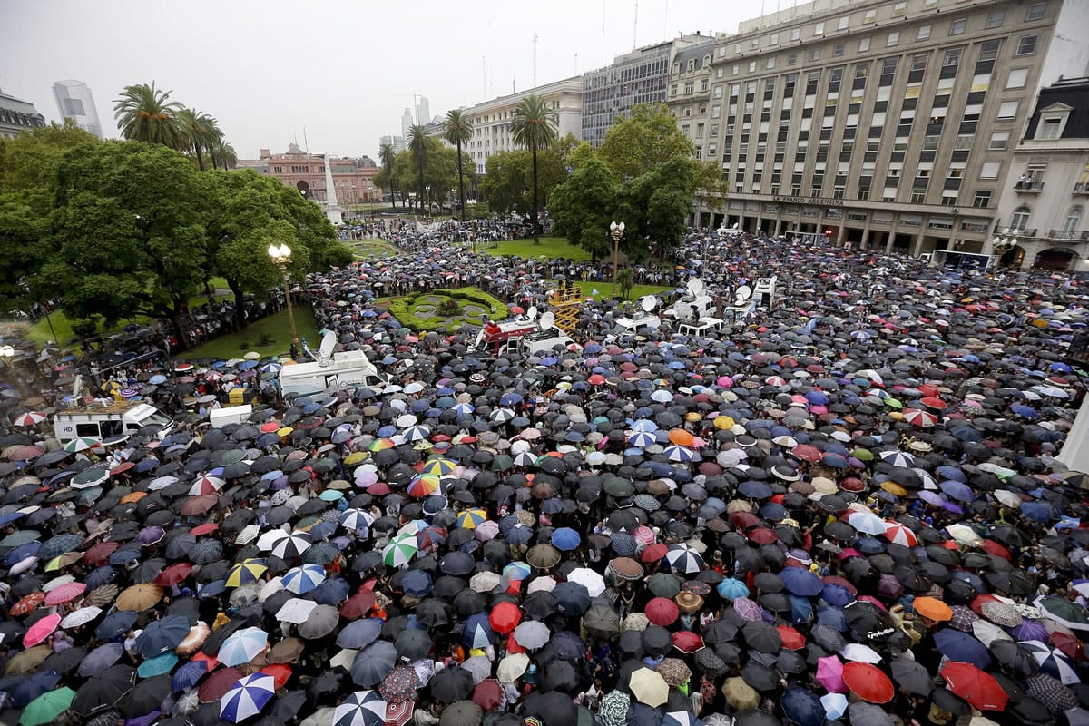 People gather in the Plaza de Mayo Wednesday in Buenos Aires, Argentina,  to demand answers from the government about the death of prosecutor Alberto Nisman one month ago.