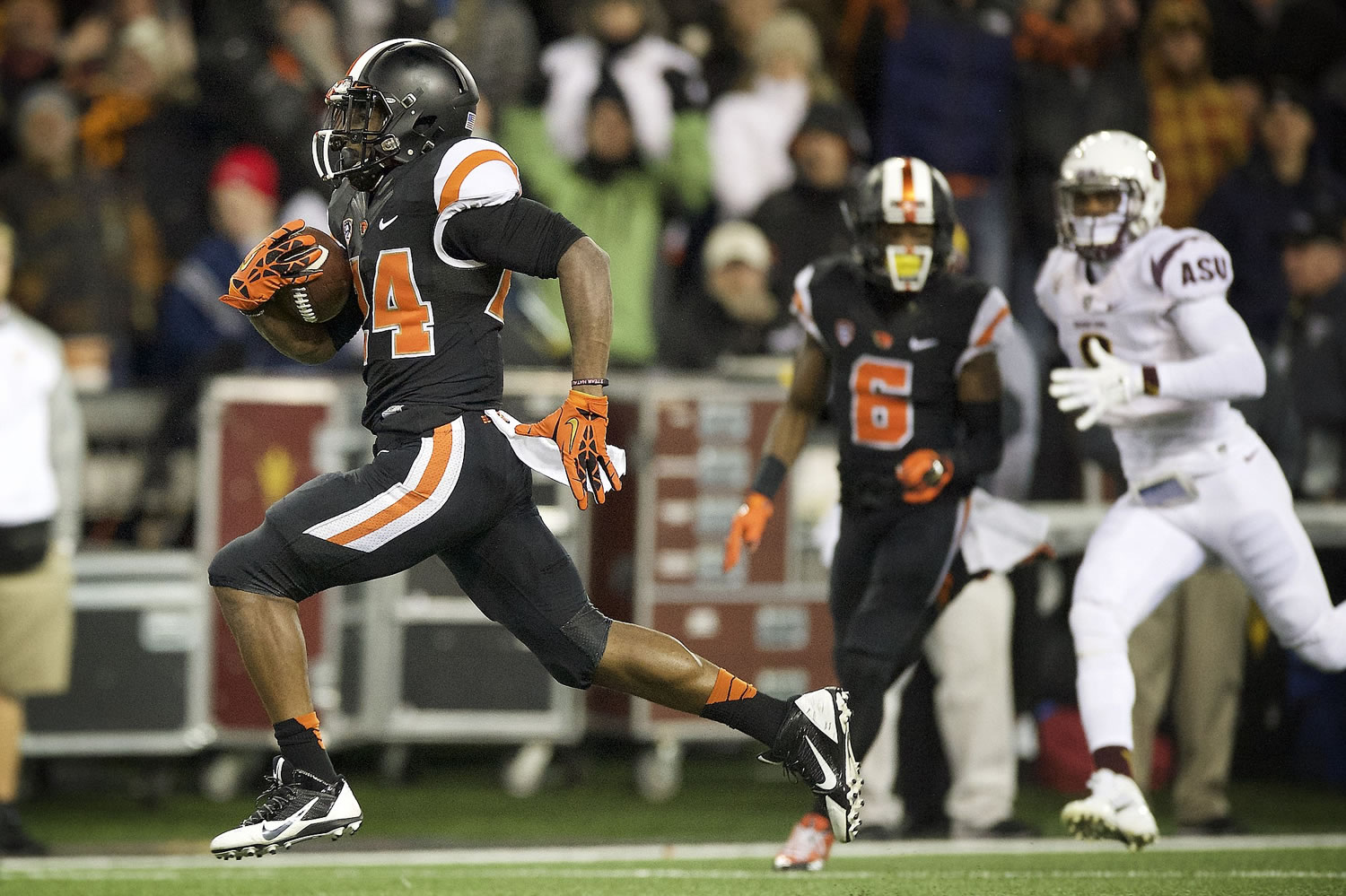 Oregon State tailback Storm Woods (24) scores a touchdown against Arizona State during the first quarter  in Corvallis, Ore., Saturday, Nov. 15, 2014.