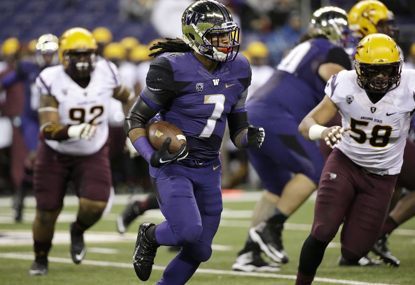 Washington's Shaq Thompson carries against Arizona State during the first half Saturday, Oct. 25, 2014, in Seattle.