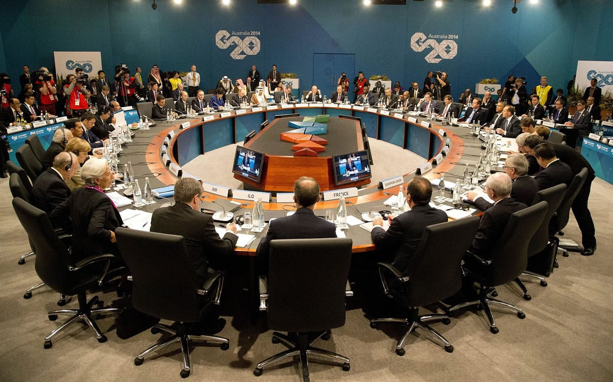 Leaders meet during a plenary session at the G-20 summit in Brisbane, Australia, Saturday, Nov. 15, 2014.