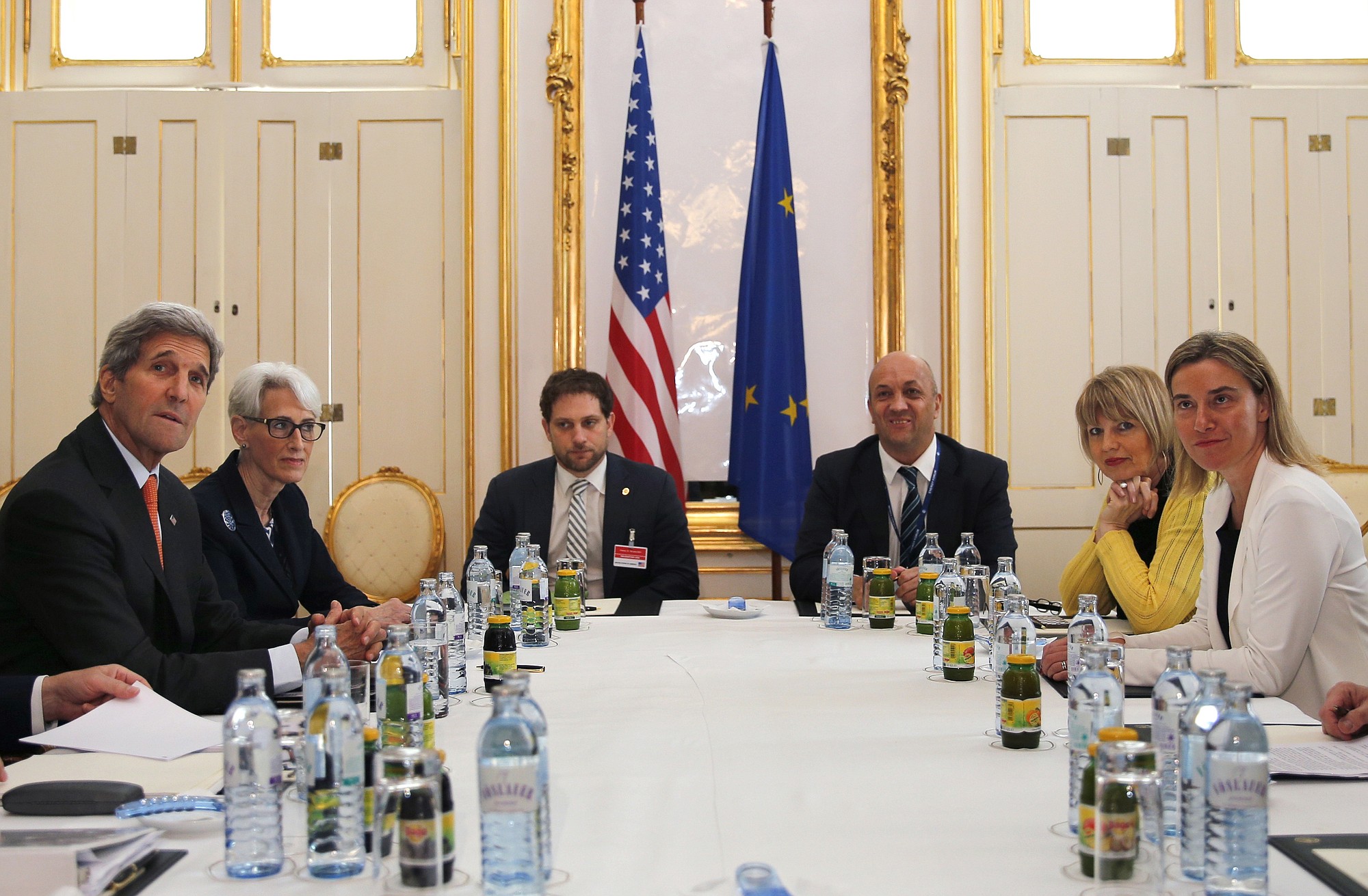 U.S. Secretary of State John Kerry, left, and U.S. Under Secretary for Political Affairs Wendy Sherman, 2nd left, meet with European Union foreign policy chief Federica Mogherini, right, at a hotel in Vienna, on Sunday. A senior U.S.