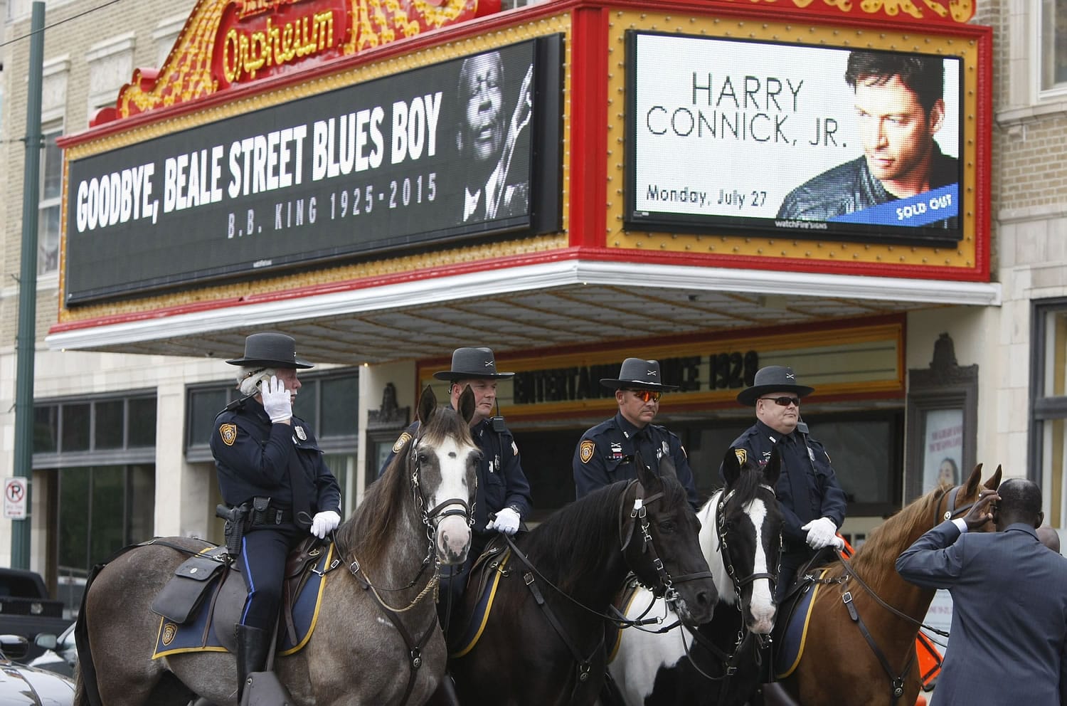 A mounted honor guard of the Memphis Police lines up for a funeral procession for B.B. King on Beale Street in Memphis, Tenn., on Wednesday. Thousands lined the street as the hearse carrying King passed. King, who was given the nickname Beale Street Blues Boy, died May 14 in Las Vegas.