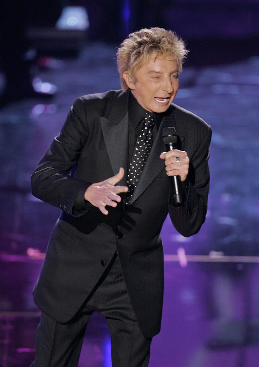 Singer Barry Manilow performs May 28 at the Moda Center in Portland. (AP Photo/Mark J.