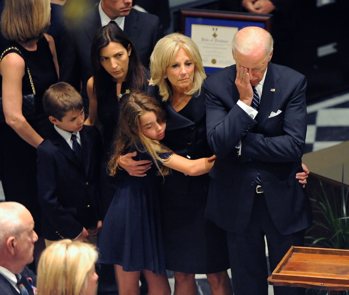 Vice President Joe Biden, right, attends a viewing for his son, former Delaware Attorney General Beau Biden, on Thursday at Legislative Hall in Dover, Del.