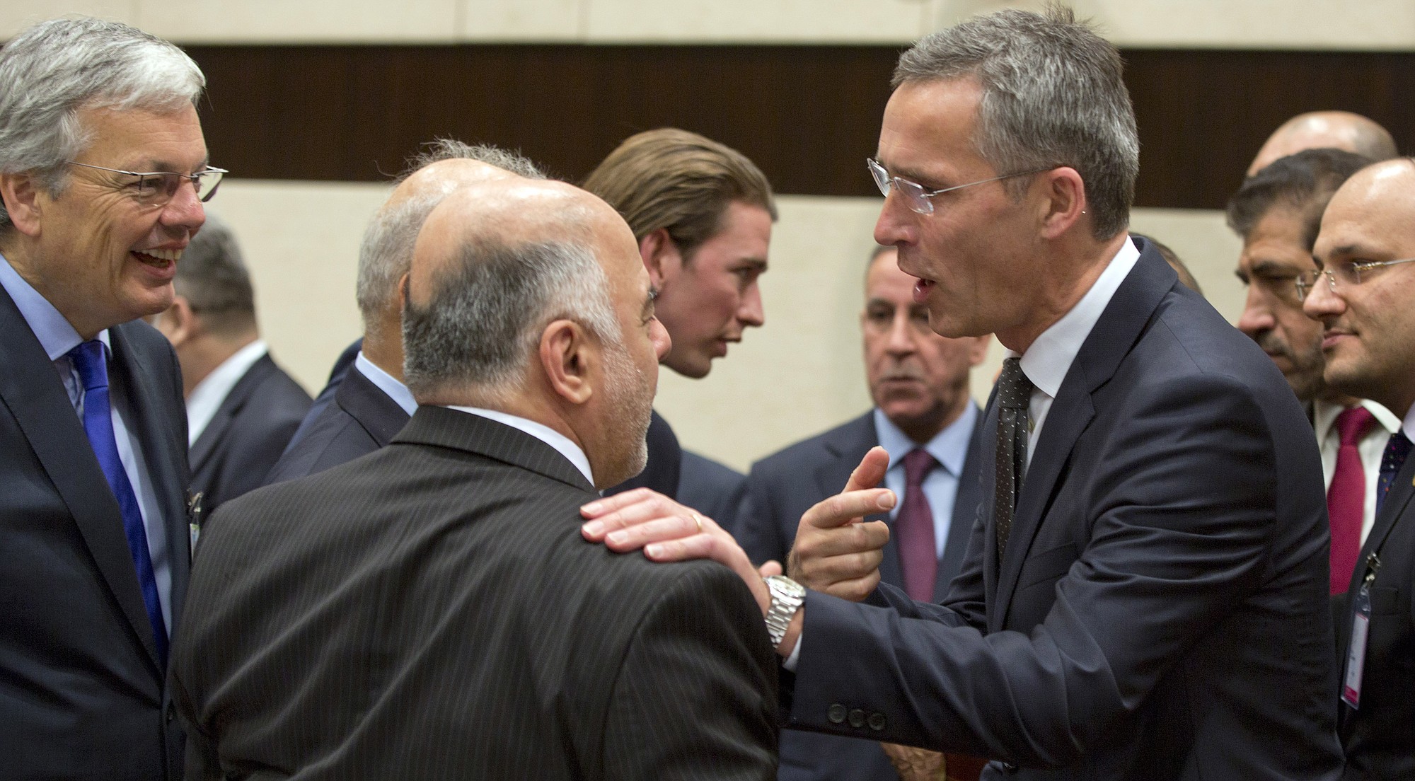 NATO Secretary General Jens Stoltenberg, center right, speaks with Iraqi Prime Minister Haider al-Abadi, center left, during a round table meeting of the global coalition to counter the Islamic State militant group at NATO headquarters in Brussels on Wednesday.