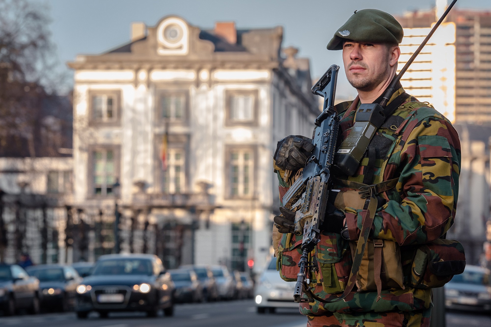 A Belgian para-commando patrols Saturday near the office of the prime minister in Brussels.