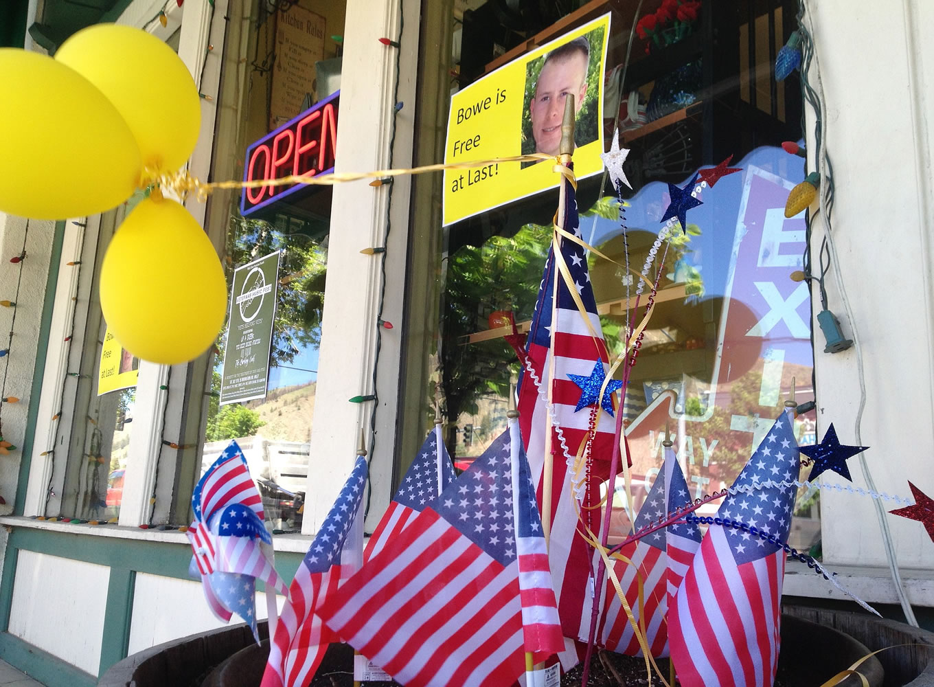 Flags and balloons marking the 2014 release from captivity of Sgt.