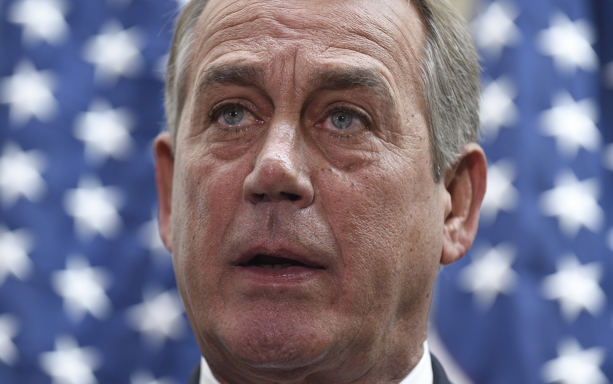 House Speaker John Boehner of Ohio speaks to reporters following a meeting on Capitol Hill in Washington.