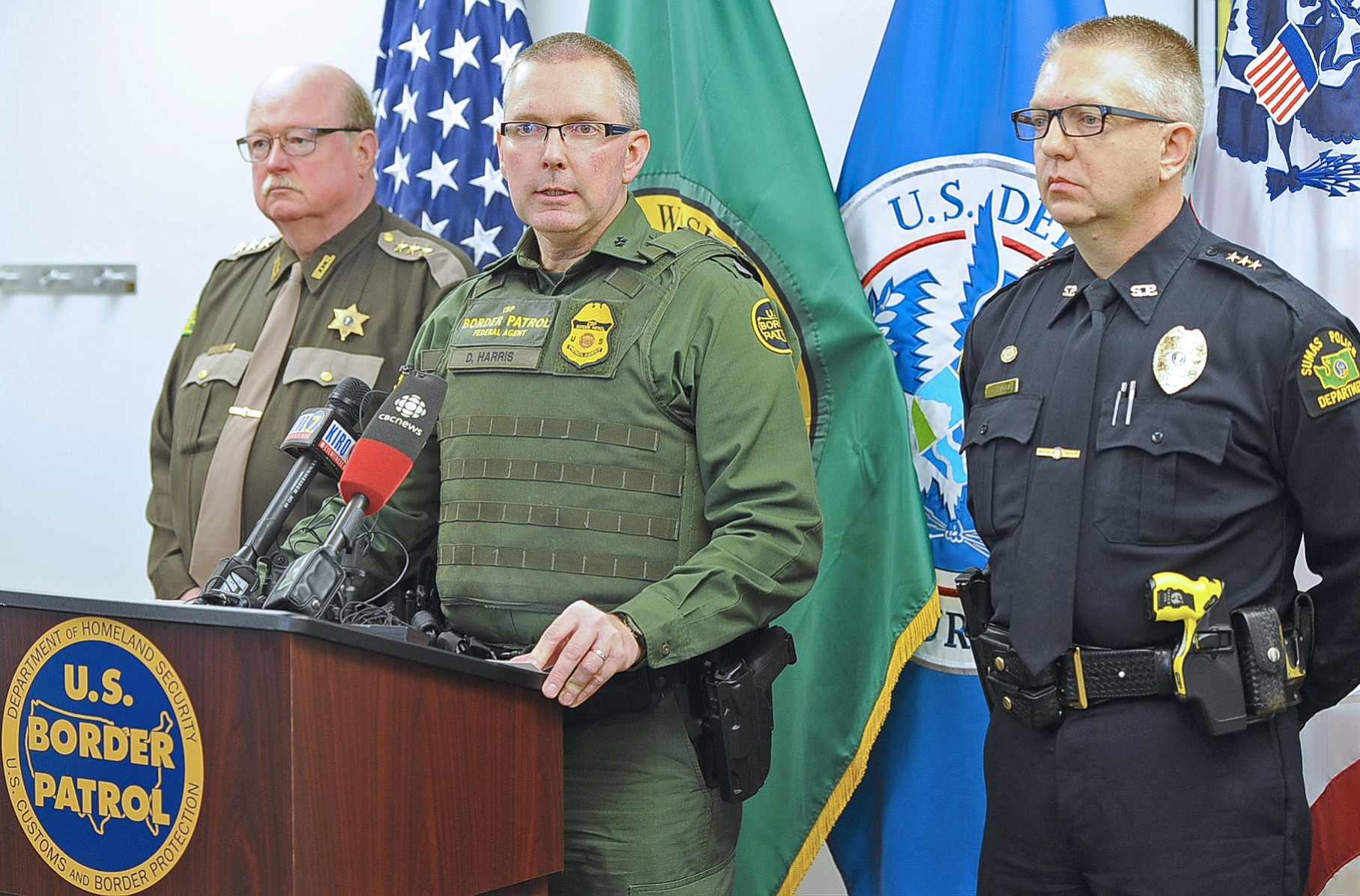 County Sheriff Bill Elfo, from left, Chief Patrol Agent Dan Harris and Sumas Police Chief Chris Haugen discuss the shooting death of a  Canadian man by a U.S.