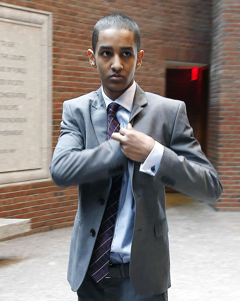 Robel Phillipos arrives at federal court in Boston for the start of jury selection for his trial in connection with the Boston Marathon bombings.