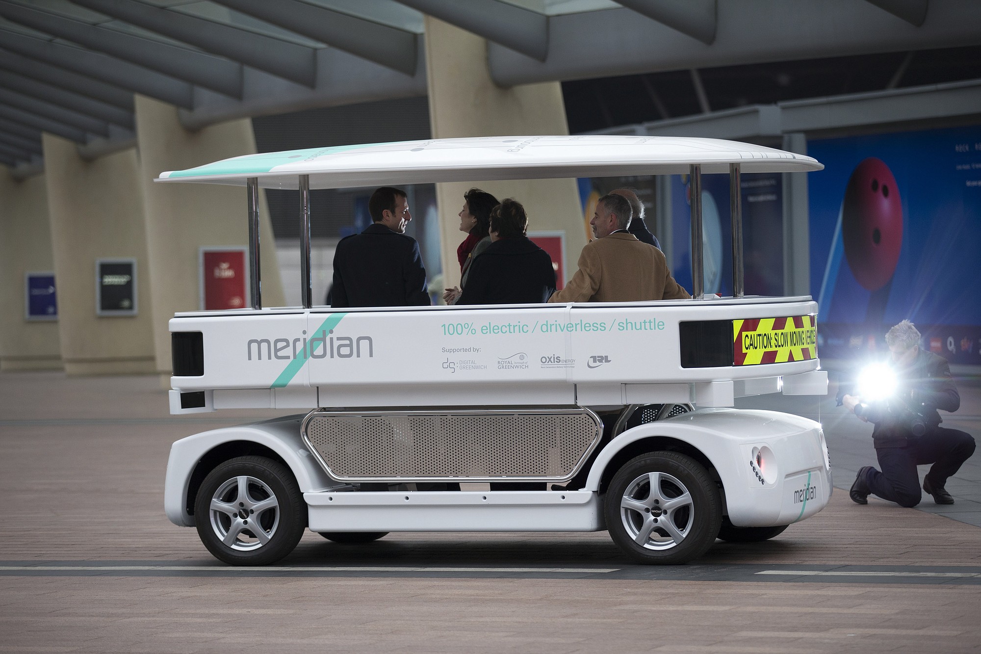Photos by MATT DUNHAM/Associated Press
Dignitaries try out a prototype driverless car called a Meridian shuttle Wednesday in London.