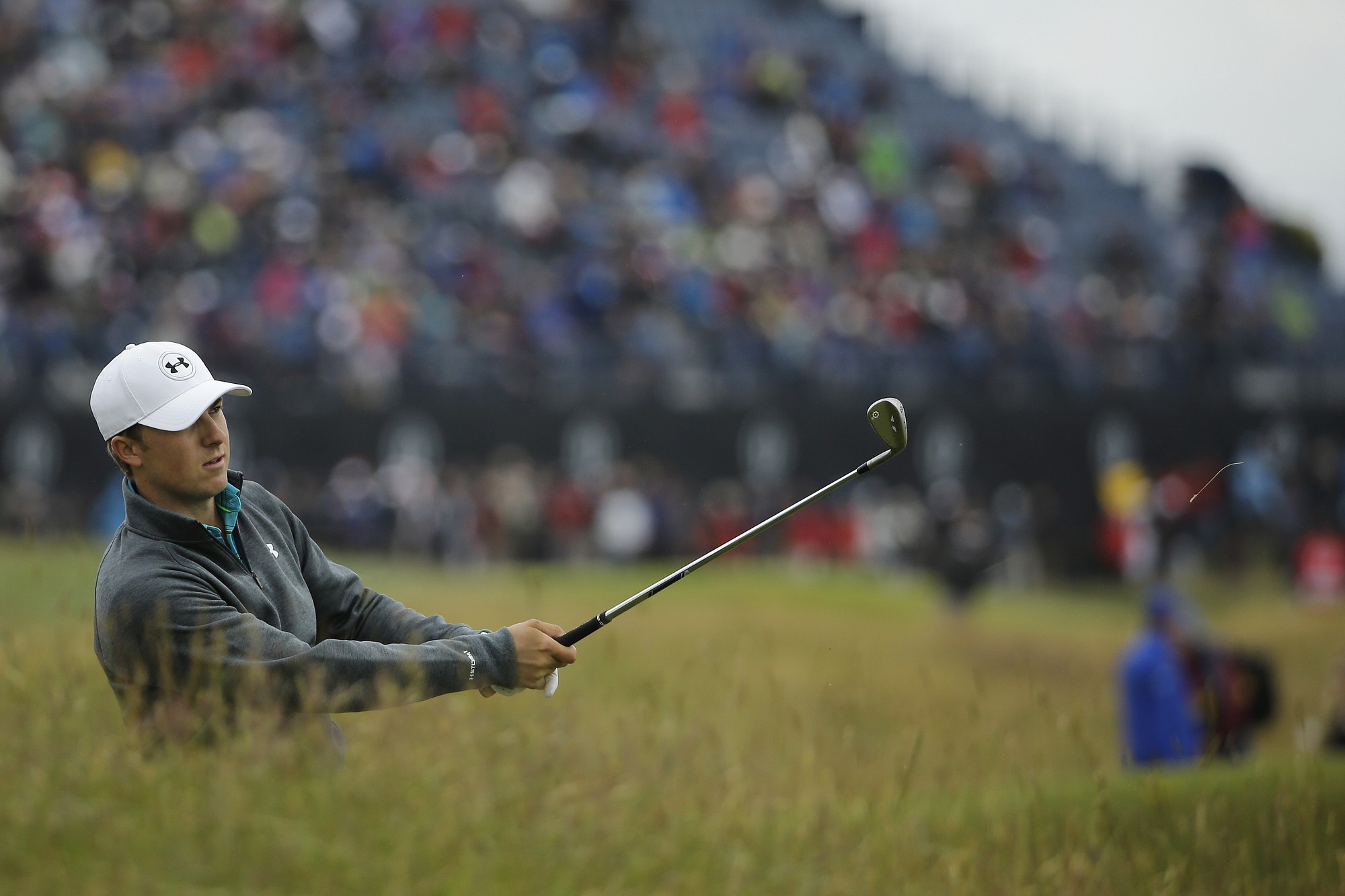 United States? Jordan Spieth plays a second shot from the 12th hole during the first round of the British Open Golf Championship at the Old Course, St. Andrews, Scotland, Thursday, July 16, 2015. (AP Photo/David J.