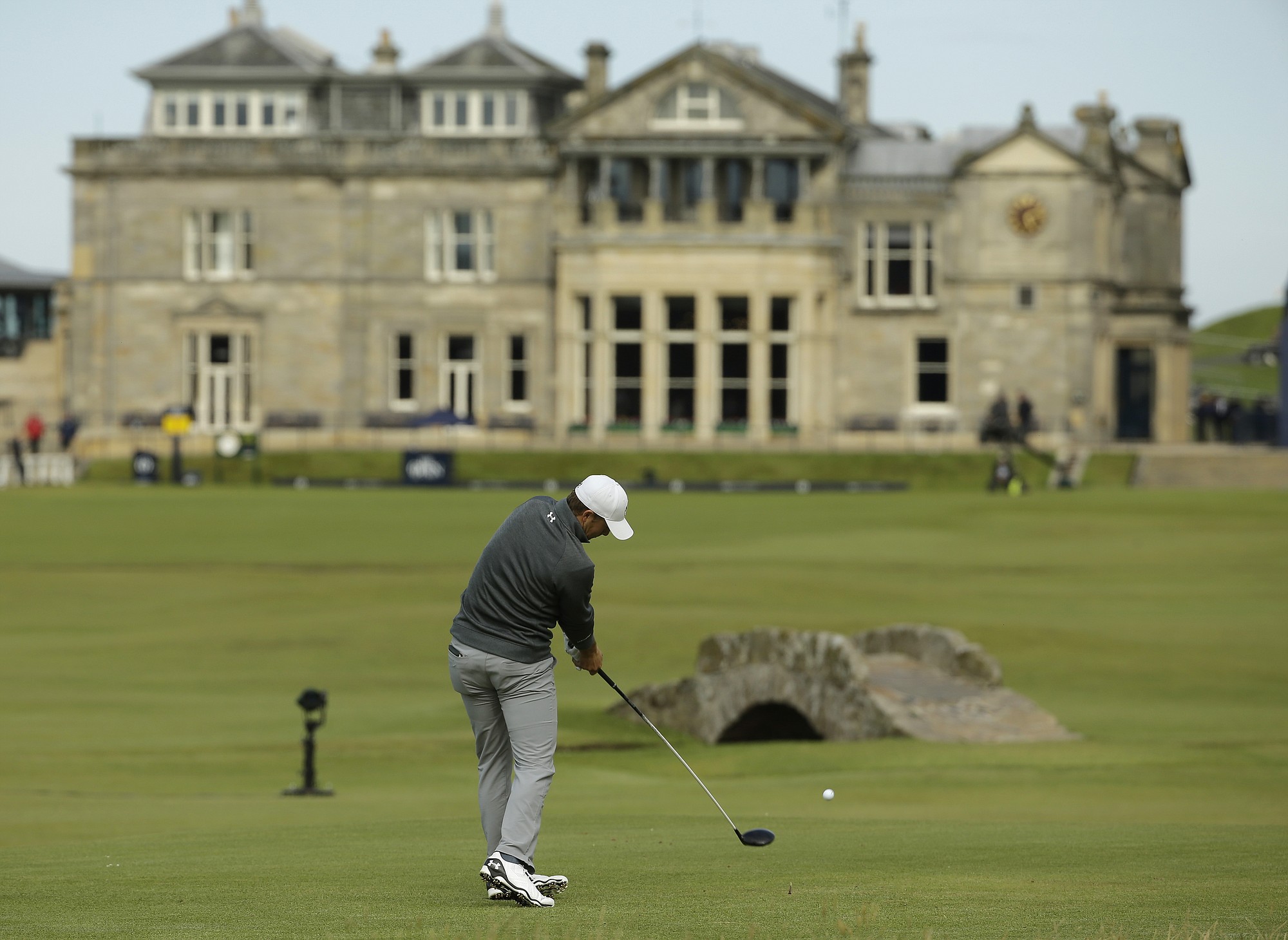 United States' Jordan Spieth drives the ball from the 18th tee during the third round of the British Open Golf Championship at the Old Course, St. Andrews, Scotland, on Sunday, July 19, 2015. (AP Photo/David J.