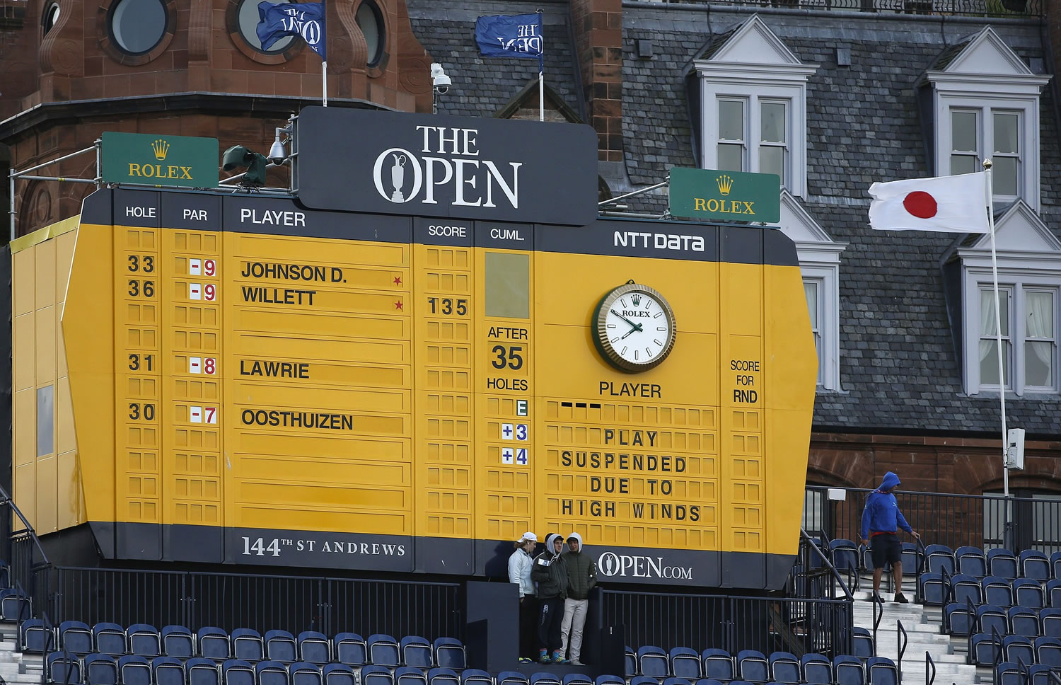 A scoreboard near the 18th hole announces that play has been suspended due to high winds during the second round of the British Open Golf Championship at the Old Course, St. Andrews, Scotland, on Saturday, July 18, 2015. Play was suspended on Saturday as high winds caused players golf balls to move on some greens.