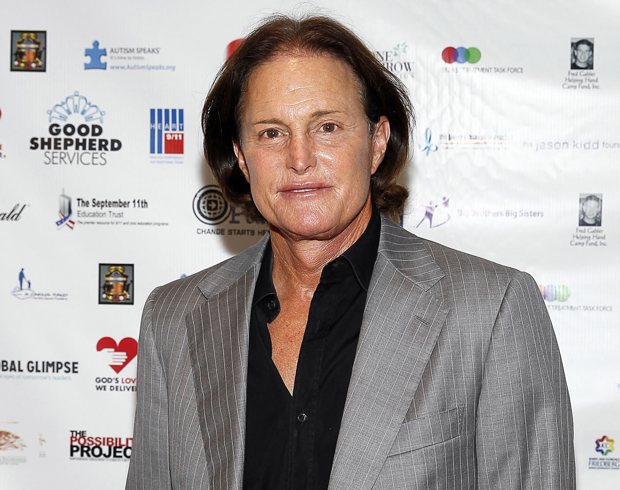 FILE - In this Sept. 11, 2013, file photo, former Olympic athlete Bruce Jenner arrives at the Annual Charity Day hosted by Cantor Fitzgerald and BGC Partners, in New York. Jenner made his debut as a transgender woman on the cover for the July 2015 issue of Vanity Fair. The image was shot by famed celeb photographer Annie Leibovitz.