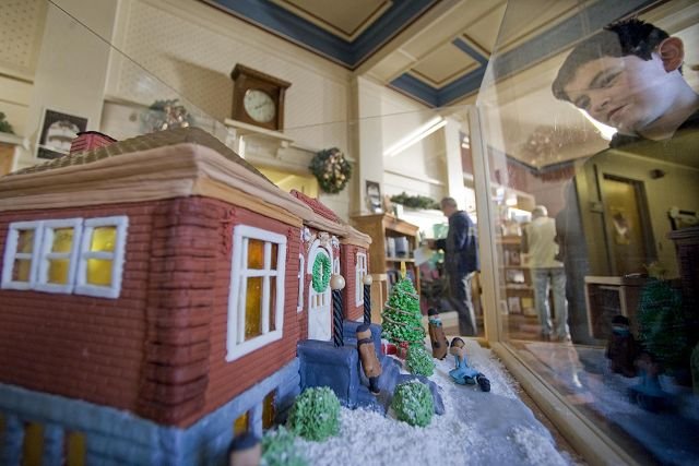 Eduardo Rodriguez, 12, of Vancouver, above, admires a gingerbread replica of the Clark County Historical Museum Saturday. The replica, by Larry Swatosh and sponsored by DSP Architecture and Wilson Associates of Vancouver, will be on display at the museum all month.