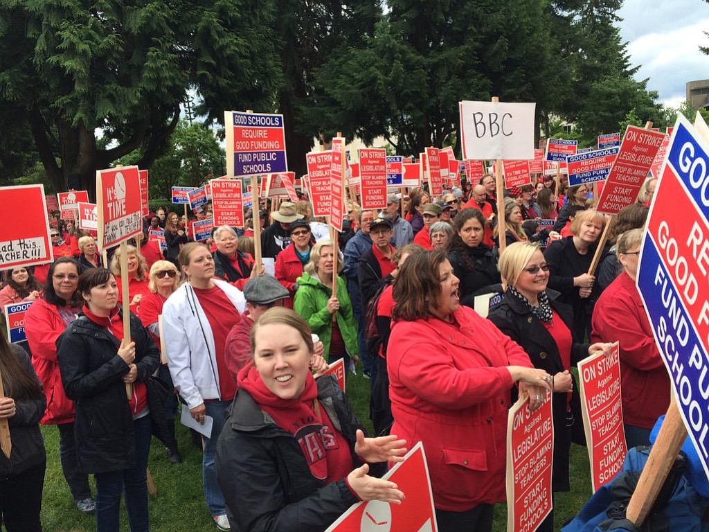 Teachers rally in Esther Short Park this morning in support of greater funding for schools.