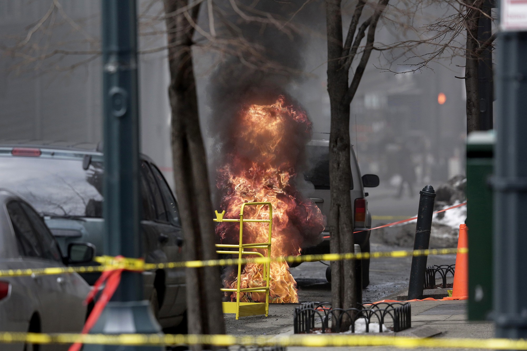 Flames rise from a manhole March 8 in New York.