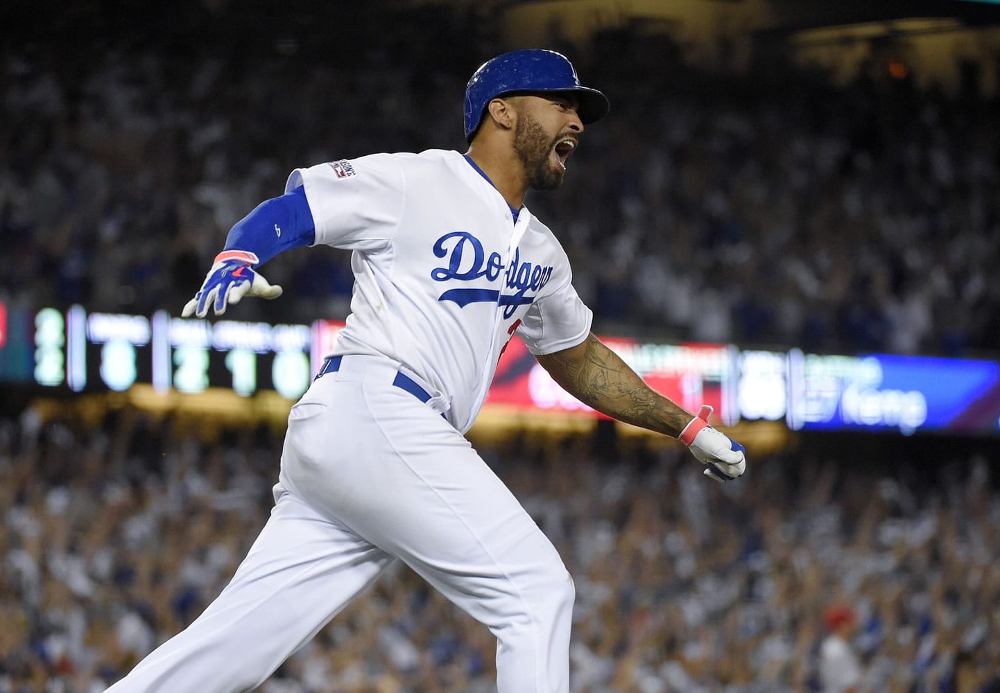 Los Angeles Dodgers' Matt Kemp celebrates his home run against the St. Louis Cardinals during the eighth inning in Game 2 in the NL Division Series in Los Angeles, Saturday, Oct. 4, 2014. (AP Photo/Mark J.