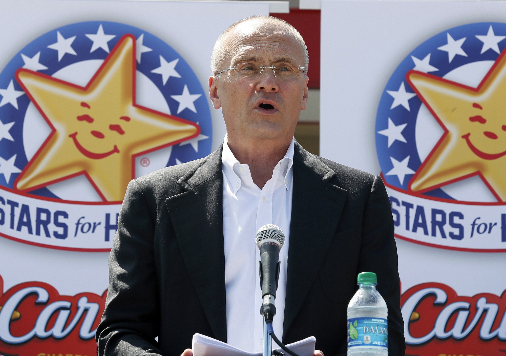 CKE Restaurants CEO Andy Puzder speaks Aug. 6 at a news conference in Austin, Texas, to highlight Carl's Jr.'s commitment to the state. Carl's Jr.