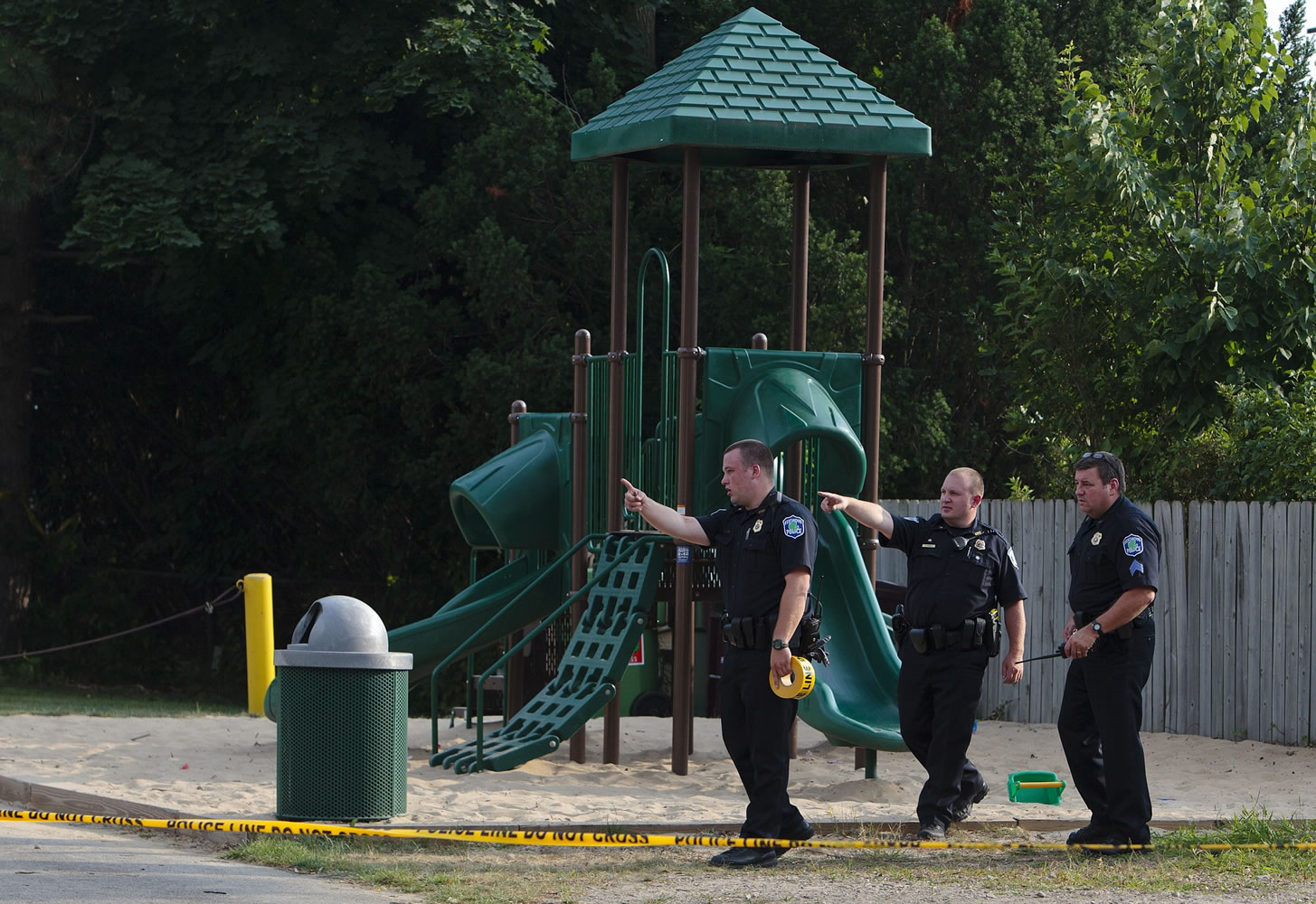 Kentwood police investigate a stabbing that occurred in a playground in Pinebrook Village, in Kentwood, Mich.