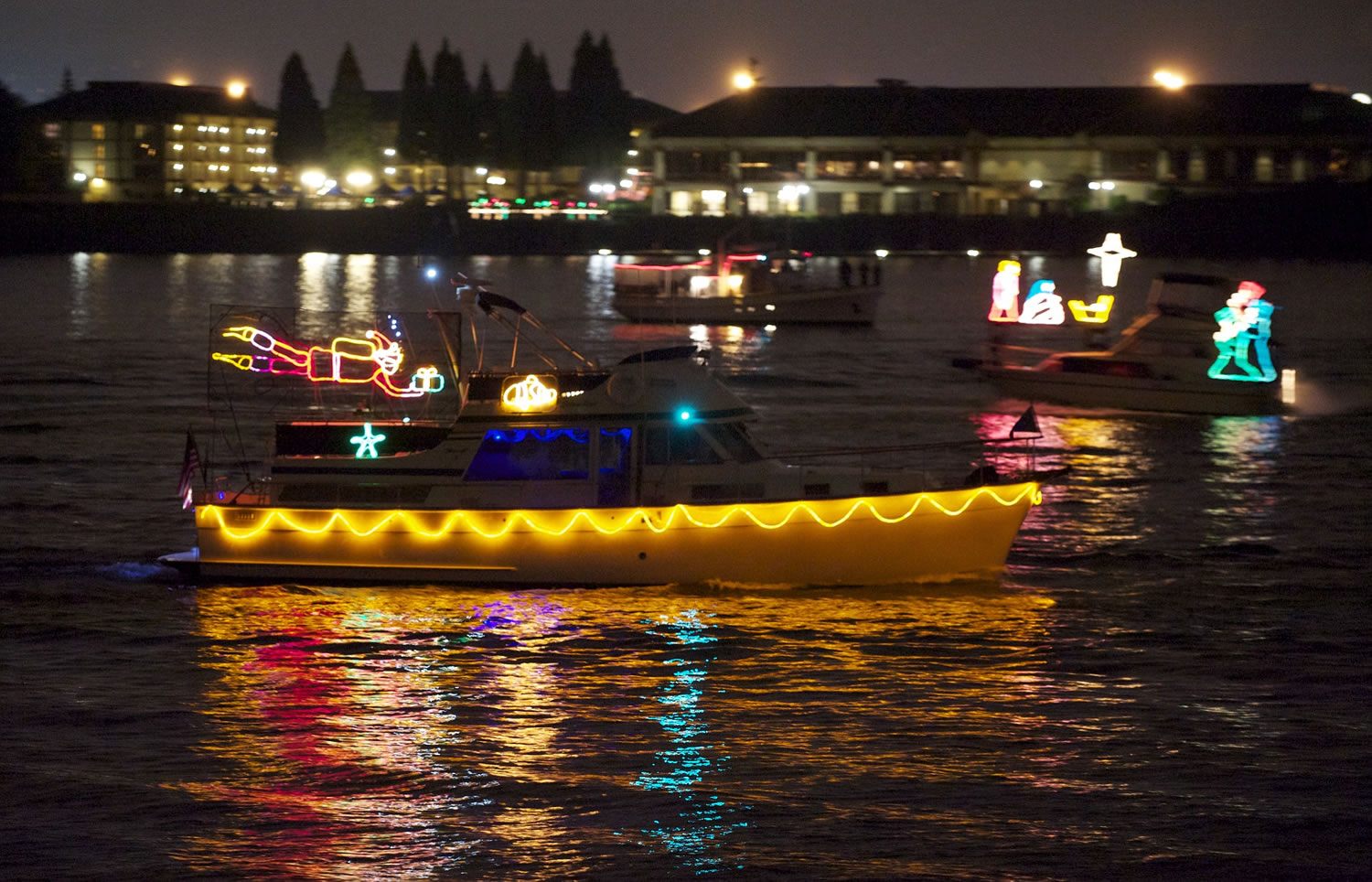 The fleet of Christmas ships will travel on the Columbia River near the I-5 Bridge during the Dec. 16 parade.