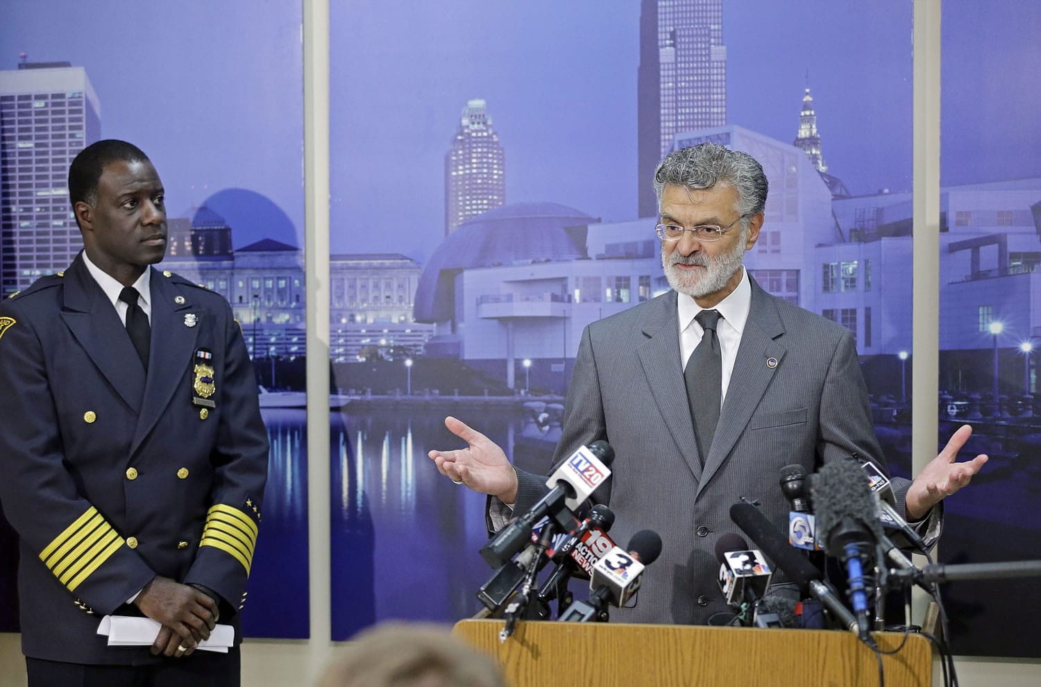 Cleveland Mayor Frank Jackson speaks during a news conference with Police Chief Calvin Johnson, left, Monday on the police shooting of a 12-year--old boy over the weekend.