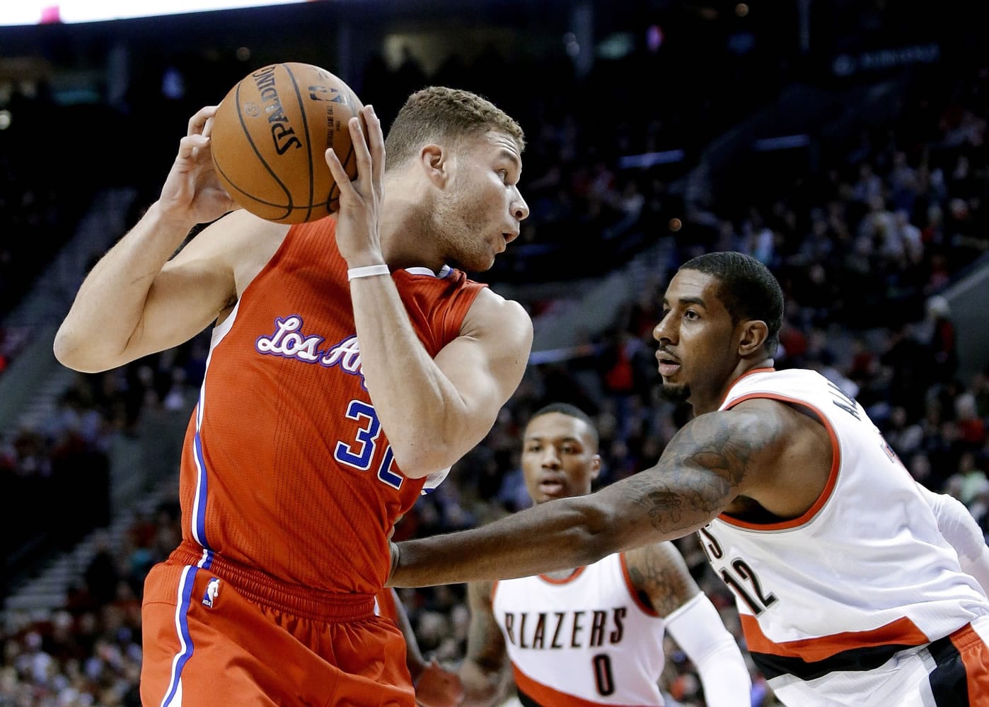 Portland forward LaMarcus Aldridge, right, checks Los Angeles Clippers forward Blake Griffin, left, during Wednesday's game at the Moda Center.