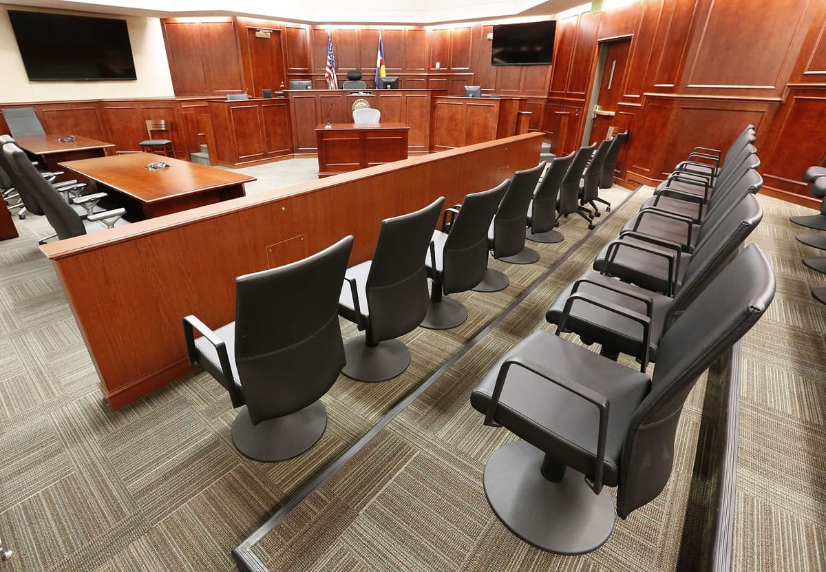 A view of the jury box, right, inside Courtroom 201, where jury selection in the trial of Aurora movie theater shootings defendant James Holmes is to begin Tuesday at the Arapahoe County District Court in Centennial, Colo.