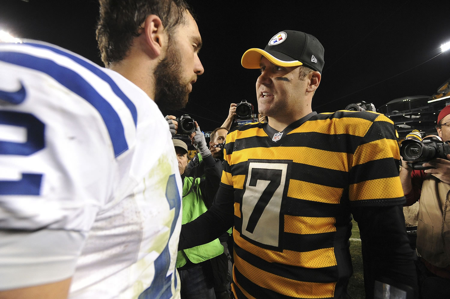 Indianapolis Colts quarterback Andrew Luck, left, greets Pittsburgh Steelers quarterback Ben Roethlisberger (7) following an NFL football game on Sunday, Oct. 26, 2014, in Pittsburgh. Pittsburgh won 51-34.