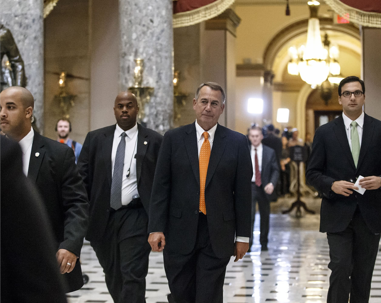 House Speaker John Boehner, R-Ohio, strides from the House floor on Capitol Hill in Washington on Friday after the Republican-controlled House passed legislation approving the Keystone XL oil pipeline.