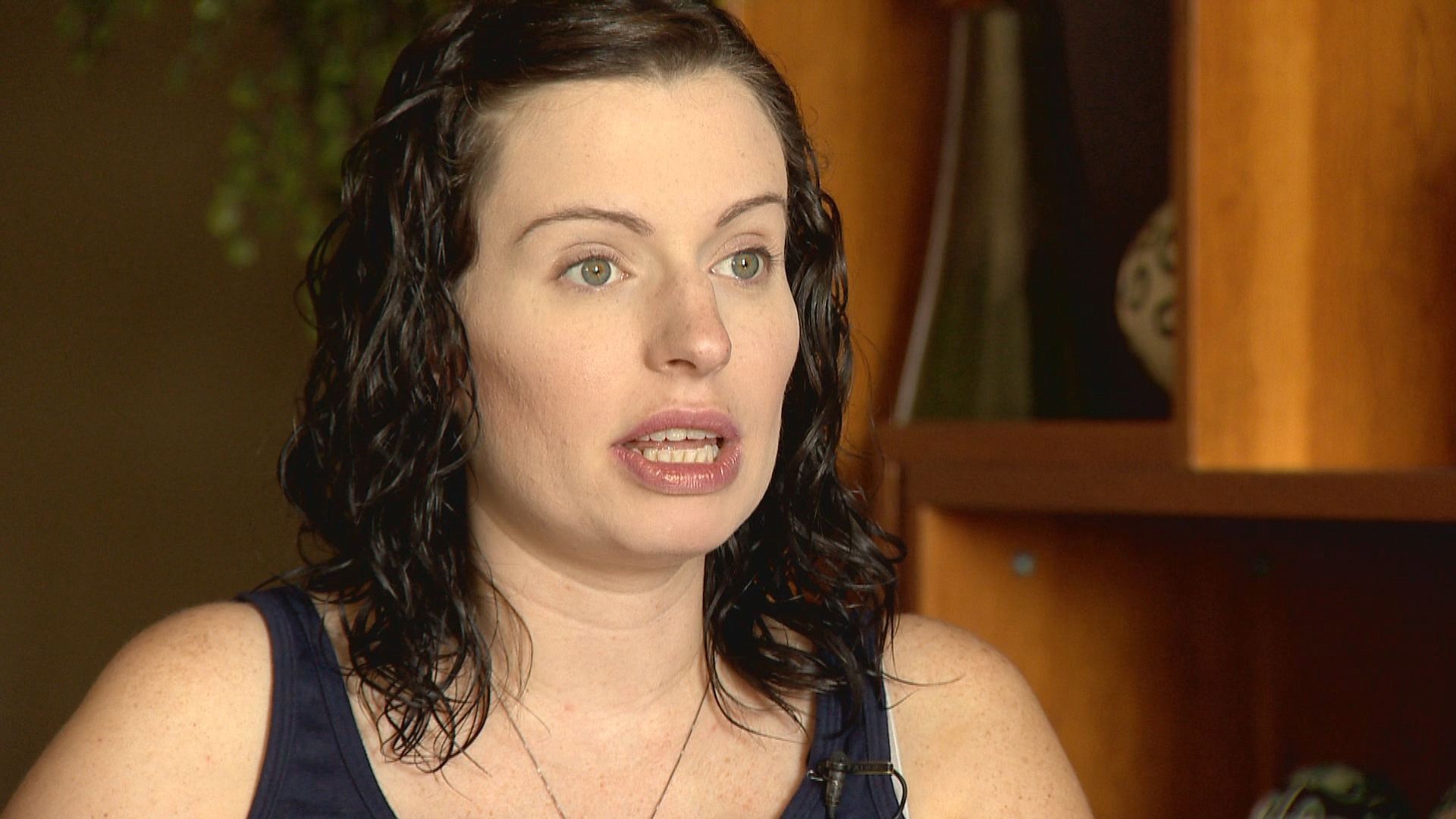 Expectant mother Amber McCullough is pictured during an interview with Colorado's KUSA-TV, a day before she was to give birth to conjoined twins in Aurora, Colo.