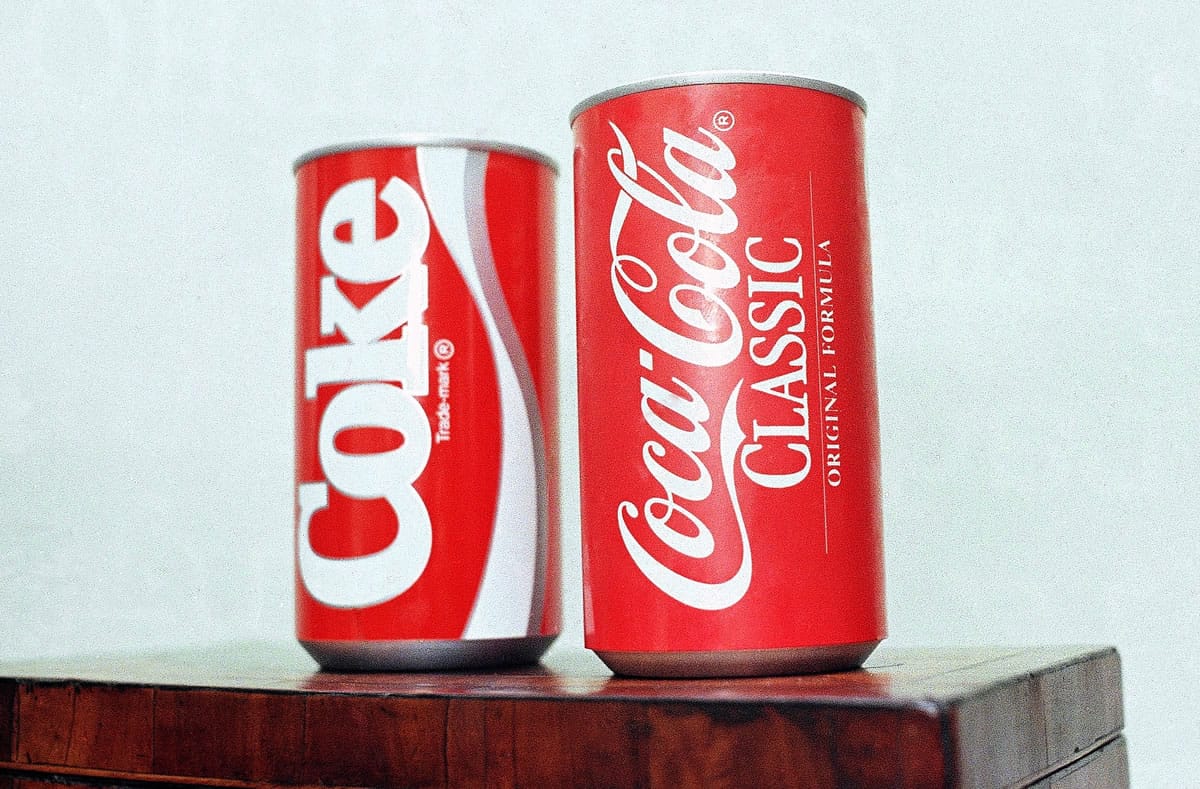Associated Press files
Cans of New Coke and Coca-Cola Classic are displayed during a news conference in Atlanta in 1985.